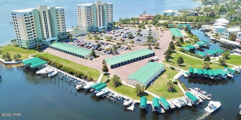 *HIBISCUS BY THE BAY* One of the most beautiful and unique waterfront gated community in Panama City Beach. Luxury living with amazing views overlooking St. Andrews Bay.  Spacious 2 Bedroom/2 full Bathroom, fully equipped kitchen with breakfast bar, large living room overlooking the bay, master bedroom is waterfront with sliding door access to the spacious balcony, master bath features tub, separate shower, double sink and a large walk-in closet.  Updated: AC, Water heater, appliances and hurricane resistant sliding glass doors,
Amenities include Tennis Courts/Pickleball, 500-foot-long fishing pier, community room, grills, picknick area and swimming pools. Location is convenient to Beautiful Panama City Beaches, restaurants and shopping.   Boatslips and garage spaces frequently come up for sale and rent. All dimensions are approx,