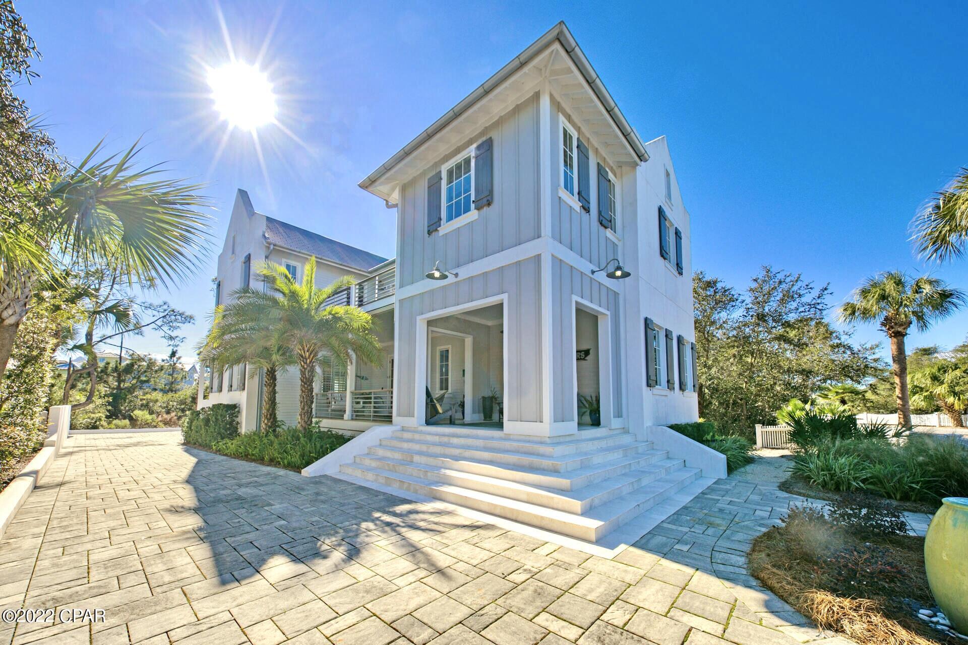 This newer construction home, one of a few coming to market in Carillon Beach in 2026, is a head turner.  Built in 2015, with 4 BR, 3.5 baths, this stunning, high-end, beach home of 2768 H&C space, was originally designed as a full-time residence, but would also work as a second home or vacation rental (as it now is).  Featuring 3 King bedrooms and one oversized bunk room, with a second living space on the 2nd floor, and an oversized entertainment patio to the rear overlooking a nature preserve, this home lives large but also feels intimate, private and inviting.  The preserve offers a measure of privacy, difficult to find in Carillon, especially when not on the gulf or Lake Carillon.  The quiet, secluded, gated community of Carillon Beach boasts 3900 linear ft. of pristine, never-crowded sugary sand. Presently the inventory of homes available for purchase in Carillon is near an historic low, while the demand is increasing significantly  The upscale shopping and restaurants of Rosemary Beach and 30AVENUE are but a 5 minute drive away. Carillon will never experience the heavy traffic associated with certain other high-end areas due to its being gated and buffered on the west by Lake Powell and Camp Helen State Park, allowing you to enjoy proximity to all of the many benefits of 30A with none of the burdens. Further, unlike several communities to the west, golf carts are permitted in the community. Carillon Beach also offers full court basketball court, tennis and pickleball courts and children's play areas.