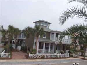 Best address in Carillon for the money. This house is priced to sell! Located in the premier gulf-front community of Carillon Beach, this gorgeous property has fantastic Gulf Views and consists of a 3 story main home with 4 bedroom/4 baths plus a loft AND Guest Cottage with 2 bedrooms/2.5 baths and sits on one of ther largest frontage lots in Carillon. This spectacular property comes completely furnished and features carpet in the bedrooms,hardwood flooring on the steps and ceramic tile throughout the rest, a built in range, Jenn Air stove top, separate icemaker, granite countertops and stainless steel appliances in the main house. The guest house offers a full kitchen, washer & dryer, 2 bedrooms/2.5 baths. Great rental potential, main house could sleep 11+ and guest house could sleep