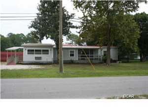 Excellent location for Commercial Business office. Newly remodeled office set up. Building can be leased with space from 400 sq ft to 1,950 of office. Also available with property is 3,800 sq ft of excellent work shop. to include 3 separate areas for enclosed tractor trailer storage for that fleet.3 rear workshops so you can service the fleet as well. EXTRA EXTRA BONUS. Underground servicing pit. To accommodate extensive self servicing of your fleet. This is the perfect set up for handling all aspects of the business. Ad this to the excellent location of this parcel with easy access to Panama City Beach Parkway with ease of servicing all of Bay County or easy access out of the area.