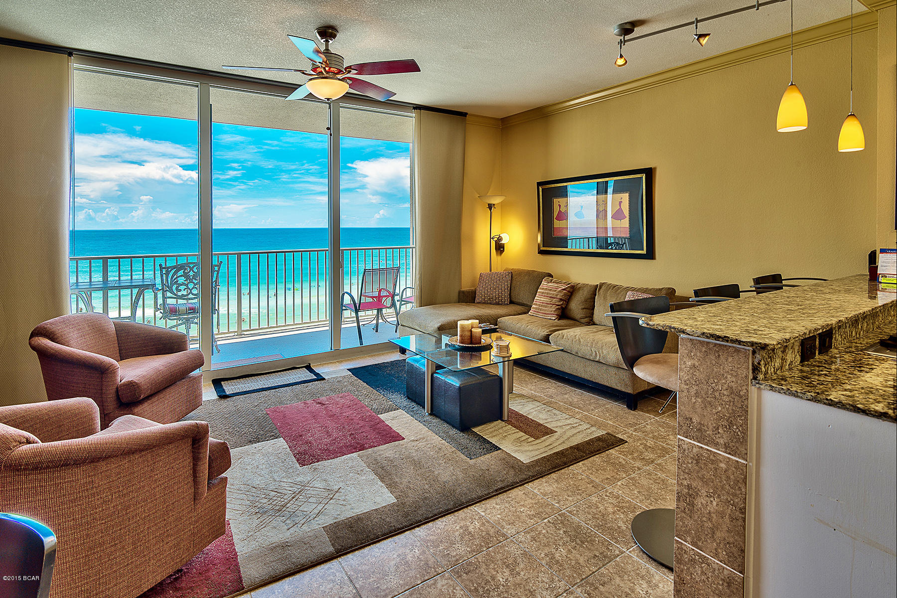 **IMMACULATE 3RD FLOOR, GULF FRONT, 2 Bedrooms + Bunk Beds and 3 Full Bathrooms**  Tidewater 311 is a premier 3rd floor ''M'' Plan at Tidewater that comes with a separate medium storage unit.  This condo comes with a STRONG rental history! Tidewater is located in one of best locations on the beach. It is the closest building to the International Airport and 1/4 of a mile to Pier Park! Tidewaters amenities bring renters back year after year. The amenities include 2 outdoor gulf front pools, 1 indoor heated pool, 2 game rooms, 1 restaurant, a convenience store, a huge beach front fitness center, movie theater, 4 hot tubs, saunas, steam rooms, conference room, cover parking, a computer lounge, library/game area, beach chair service & a beautiful owners lounge located on the 30th floor.