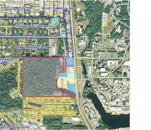 BANK FORECLOSURE OPPORTUNITY: 40.4 Acre of land in an incredible location with a multitude of possibilities. Approved density is R-5 (multi-family 15 units per acre) with a maximum height of 10 stories along with Approximately 8 acres of C-3 commercial zoning of. High traffic area. Class A Retail fronts most of this property with several national chains anchoring it. LaQunita, UPS, SAKE Sushi House, and many other major restaurants and retailers provide an additional value add to this property. Click on additional pictures for architectural appeal and layout of front retail development. Close proximity to Bay Point, Preserve, St. Andrews State Park, Nationally recognized golf courses (Jack Nicklaus design course) Nationally recognized restaurants (Captain Andersons), and the worlds most beautiful beaches. Directly across Thomas Drive is the Naval Surface Warfare Center Panama City Division which employs in excess of 2,000 civilian and military personnel WITH $117 MILLION IN DIRECT PAYROLL. All information estimated and should be verified by seller if important. Boundary survey, topography, recent proposed engineering and marketing and information package available upon request.