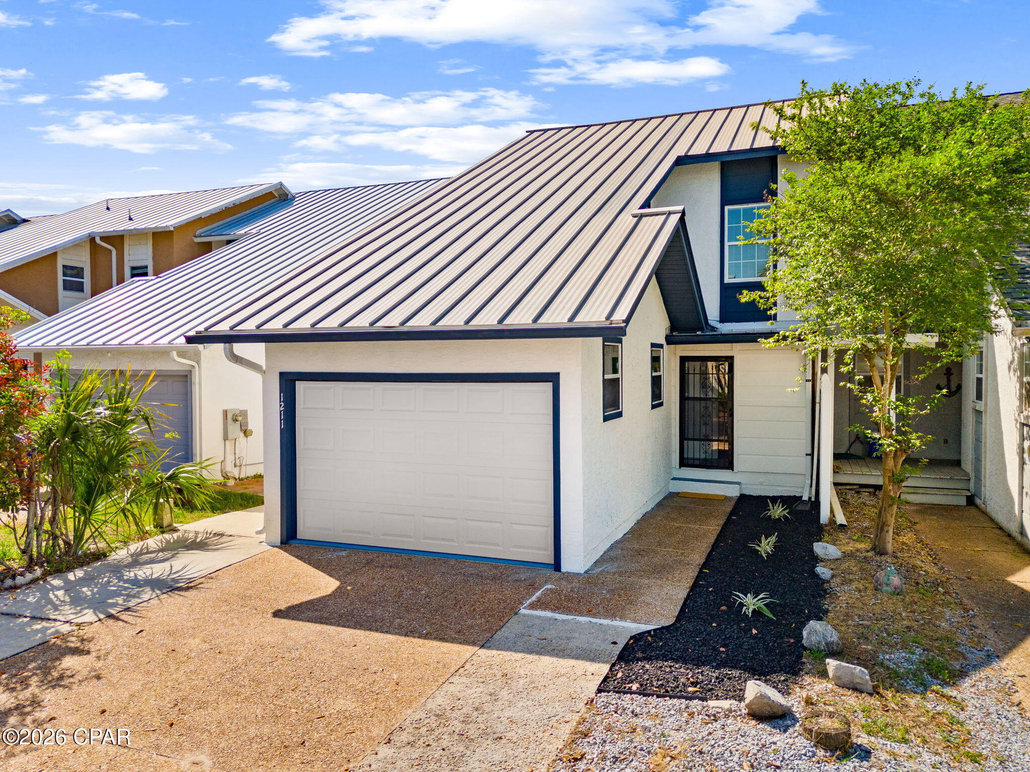Experience waterfront living at this beautifully updated 3-bedroom, 2.5-bath duplex, perfectly situated in one of the most sought-after areas in town. This stunning property has been completely transformed with a modern design throughout.

Step inside to find fresh paint, a fully updated kitchen, and stylishly renovated bathrooms, offering a clean, contemporary feel from top to bottom. Every detail has been thoughtfully upgraded, making this home truly move-in ready with no work needed. Go green and save--this home comes equipped with fully paid-off solar panels, delivering sustainable living and significant energy savings without any added expense.

Enjoy outdoor living with a spacious deck -perfect for entertaining or relaxing - and your own private dock with direct Gulf access. Whether you're an avid boater or simply love spending time by the water, this property offers the ideal lifestyle.

Don't miss this rare opportunity to own a waterfront home that combines comfort, style, and unbeatable location!