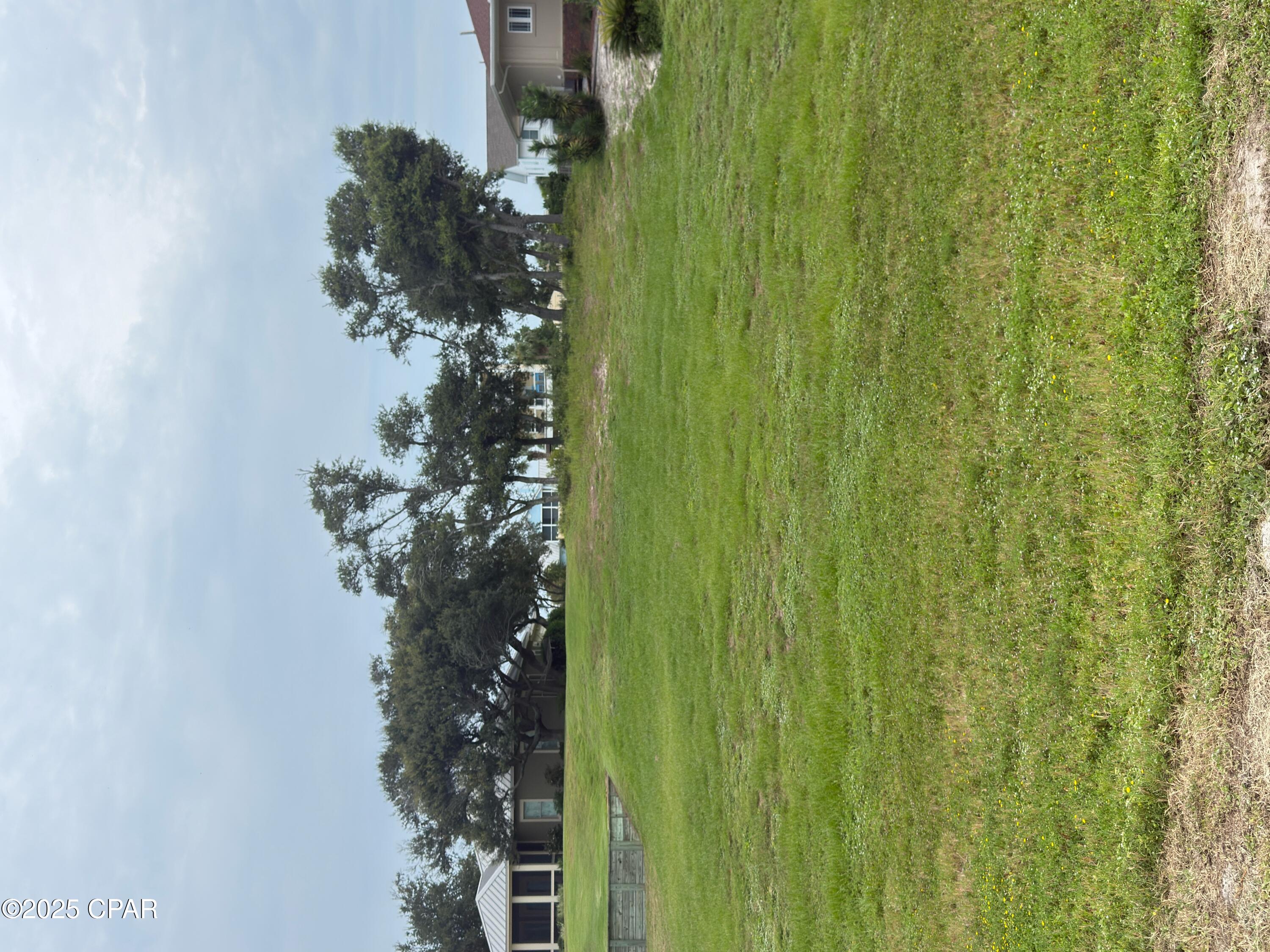 Beautiful elevated Gulf View Building lot located in Beacon Hill. This is not one of the postage stamp lots crammed on Highway 98, Rather, one of the last large gulf view lots that is 75' x 250' and .43 acres MOL as well as located in the X FLOOD ZONE. Enjoy elevated yet ground floor living options which is very rare at the beach. Very close to Lightkeeper's county park that has walking trails, amphitheater, pickle ball courts, dog park, picnic facilities, boardwalk for Gulf of America. Bring your plans and get ready to enjoy gorgeous sunsets. Some dimensions were obtained from the Gulf County Property Appraiser's website, please verify if important. Please do not use the neighbor's driveway for access as this is not part of the property