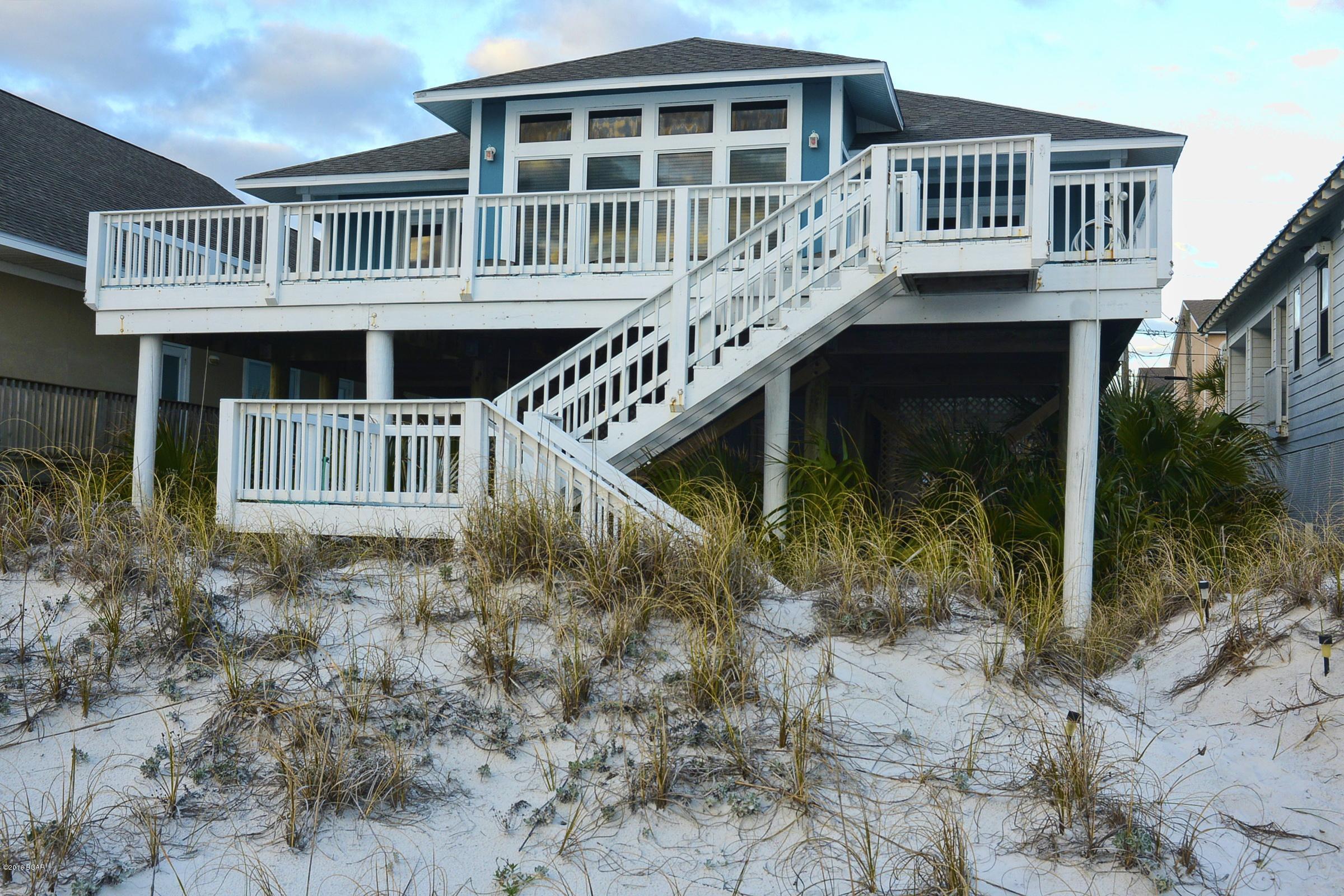 GULF FRONT AWESOMENESS. 10 DOORS WEST OF SCHOONERS. FANTASTIC BIG VIEWS WITH 10FT CEILINGS LARGE AREAS TO ENTERTAIN AND SPREAD OUT. ENJOY YOUR FABULOUS SPACE AT THE MOST BEAUTIFUL BEACHES IN THE WORLD. THIS HOME IS TURN KEY AND IS READY FOR YOUR FAMILY TO ENJOY. RELAX ON THE LARGE PORCHES OVERLOOKING THE GULF WATCHING THE DOLPHINS PLAY AS YOU SIP YOUR MORNING COFFEE. SELLERS ARE AN ESTATE THAT DOES NOT USE ANY MORE.SELLING AT AN INCREDIBLE PRICE.