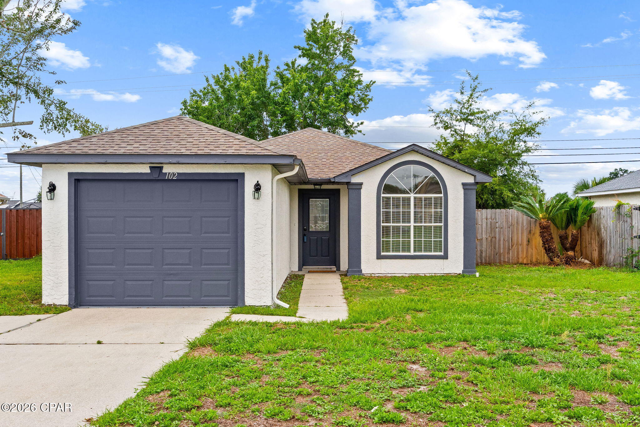 Don't miss this charming and exceptionally well-kept 3 bedroom, 2 bathroom home. Whether you're a first-time homebuyer, looking to downsize, or searching for a great investment opportunity, this home is ready for its next owner.

Inside, you'll find a clean, move-in-ready interior that has been fully maintained. The home features a fully enclosed porch, providing additional flexible space for relaxing or entertaining.

Outside, the fully fenced backyard offers privacy and plenty of room for pets, gardening, or outdoor gatherings. A one-car garage provides convenient parking and extra storage space.

Conveniently located just approximately 15 minutes from Tyndall Air Force Base, this property combines affordability, comfort, and accessibility.