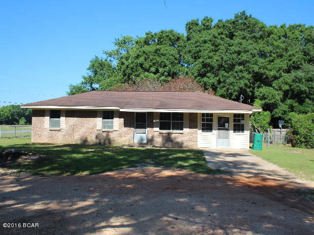 Brick house just outside of Cottondale on nice corner lot. Back yard is completely fenced and there is a nice size yard building for storage. The house has a living room, 3 bedrooms, a large kitchen/dining area and a den. There is a neat rear wooden deck. The yard is very nicely shaded with beautiful trees.