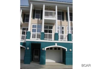 This is a 3 story town home that has 5 bedrooms (or 2 bonus rooms); 2 of the bedrooms have closets in the hallway. Stainless steel appliances, granite counter tops, ceramic tile floors, One of the bedrooms is located on the first floor and is a complete self-contained lockout unit perfect for guests. Master Bedroom has a balcony that has a view of the Gulf of Mexico and there is an elevator in the home. There is also a community pool on site.