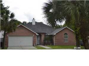 Beautiful Deerpoint well-cared for home with lots of natural light and special details throughout! Walk into a spacious open living room with 10ft ceilings, crown molding, tile floors, lots of natural light, built in bookshelves and wood burning fireplace. The kitchen offers lots of glass front cabinets and counter space with breakfast bar, counter tops are all granite and features new appliances. Breakfast/dining area has a door to the back porch and pool area. This home offers 3 roomy bedrooms and 2 full baths. The master bedroom is spacious with a sitting area overlooking the pool with lots of windows. Master bathroom has walk in closet, lots of room, includes a grand garden tub with separate shower and separate his and hers vanity sinks. There is one traditional bedroom and other