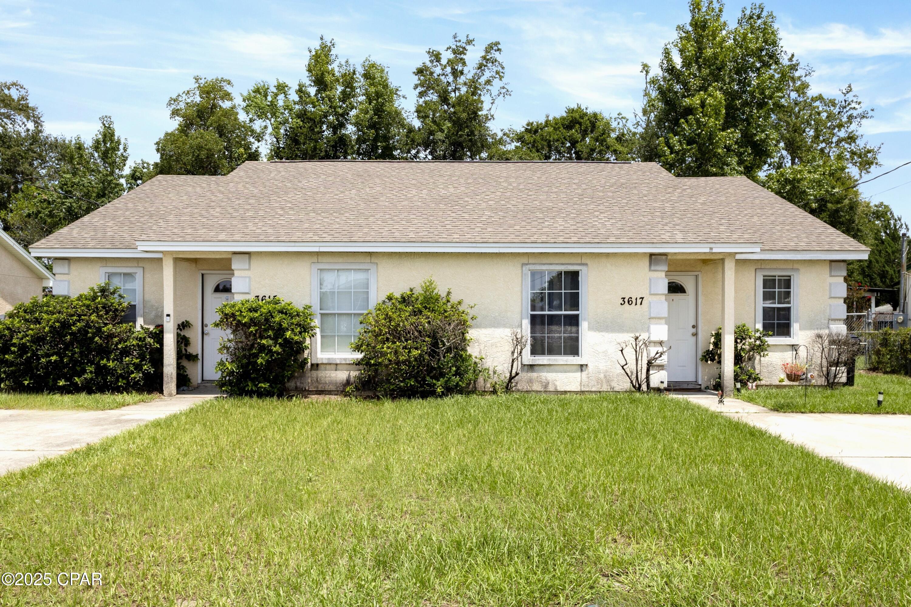 INVESTMENT OPPORTUNITY - DUPLEX FOR SALE!  This 2007 duplex includes both units 3615 and 3617 in the sale. Each side offers 2 bedrooms, 2 bathrooms, a vaulted ceiling, a laundry room, and an open floorplan. Situated on a 70x126 lot, the property features a driveway for each unit, a large divided backyard, and an open patio.  With good rental history, this property works equally well as a full investment or a home with income potential.  It is also centrally located for quick access to Panama City and Callaway amenities, shopping, dining, and schools.  Don't miss this opportunity—call today to schedule your preview!