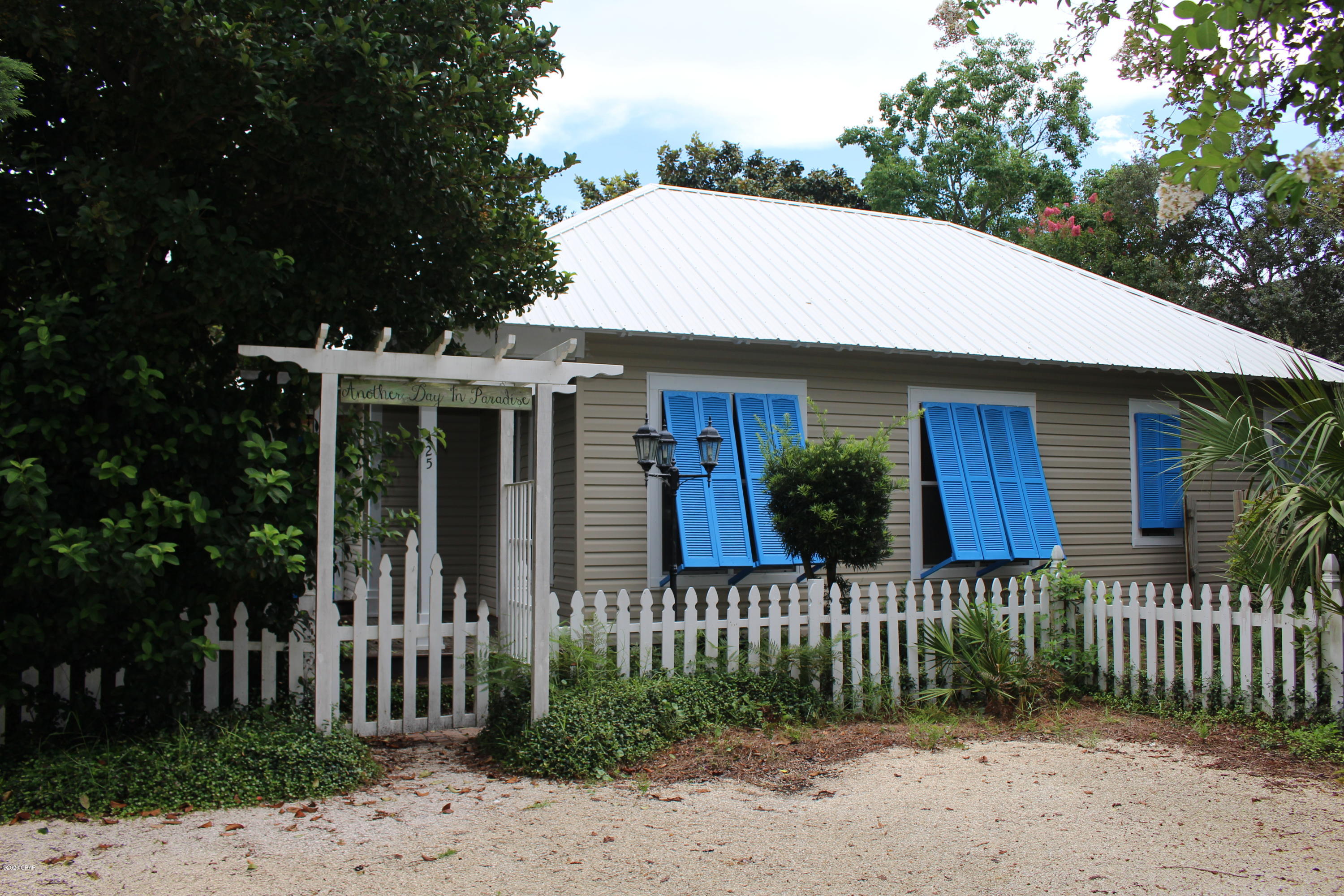 Beautiful custom built home with self-contained mother-in-law suite. Two bedrooms in the main house and a 421 sqft mother in law suite with full bath and separate entrance (there is an internal door connecting both sides). Just a short walk to the pristine beach with direct beach access. Located on the quiet west end of the beach, this home boasts 10 ft. ceilings, tile floors, fluted crown molding. Conveniently located between Pier Park and 30-A. Lush, mature tropical landscaping and bent oaks make this home feel like an island getaway, great re decks and fenced in yards. To arrange viewing- complete application on property manager's website. No application fee until you view inside and wish to move forward - then $30 per persons over 18yrs. APPLICATION REQUIRED PRIOR TO SHOWING.
