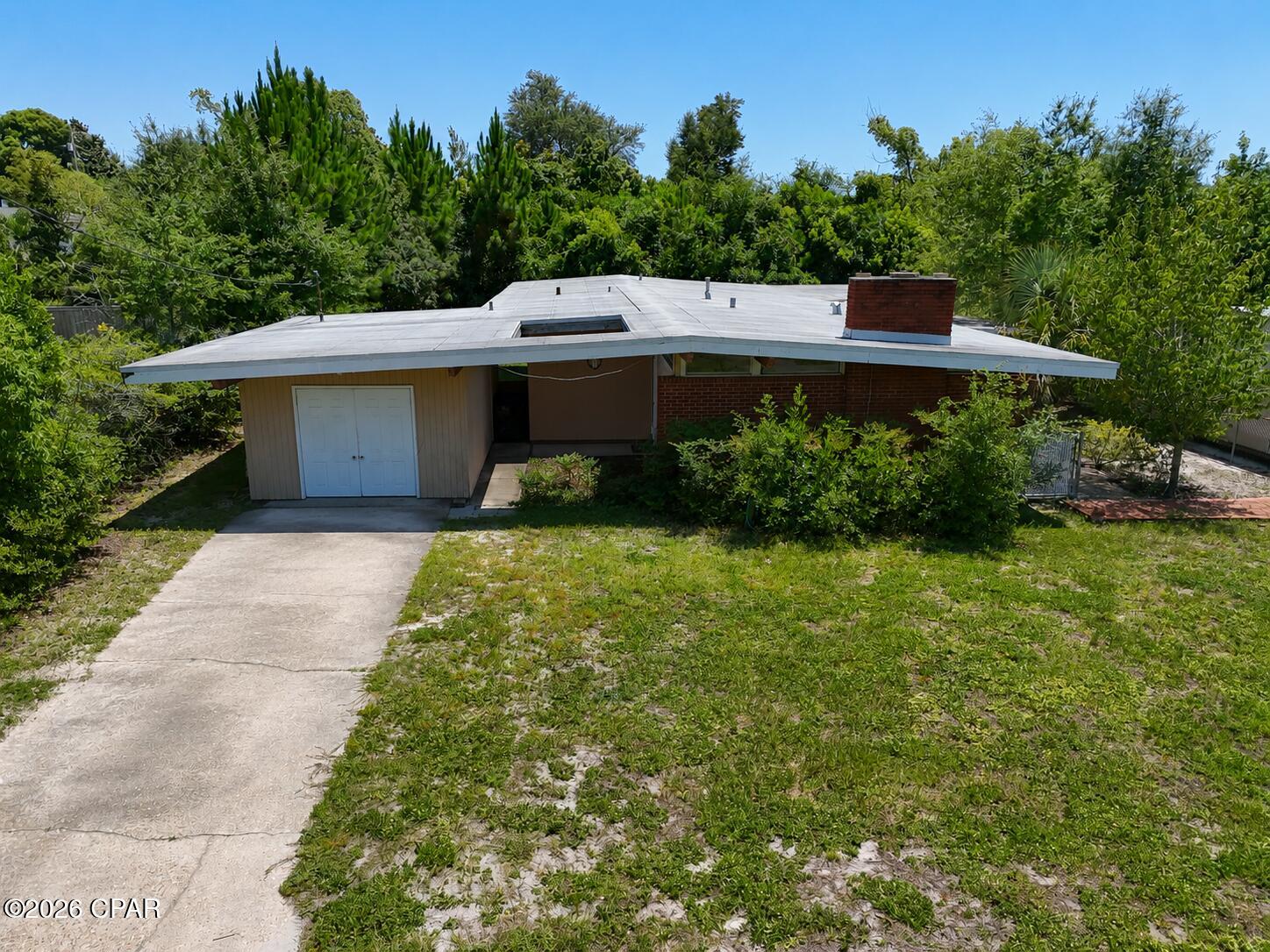 This home is in the desirable neighborhood of ''The Cove'' the home was rebuilt after Hurrican Michael, but still has items to be completed and the seller is not in a position to do them. We will have a OPEN HOUSE on July 12 to have an afternoon of one day showings only. AC does not work,  Gas does not work. This is a fixer upper! New Roof 2019