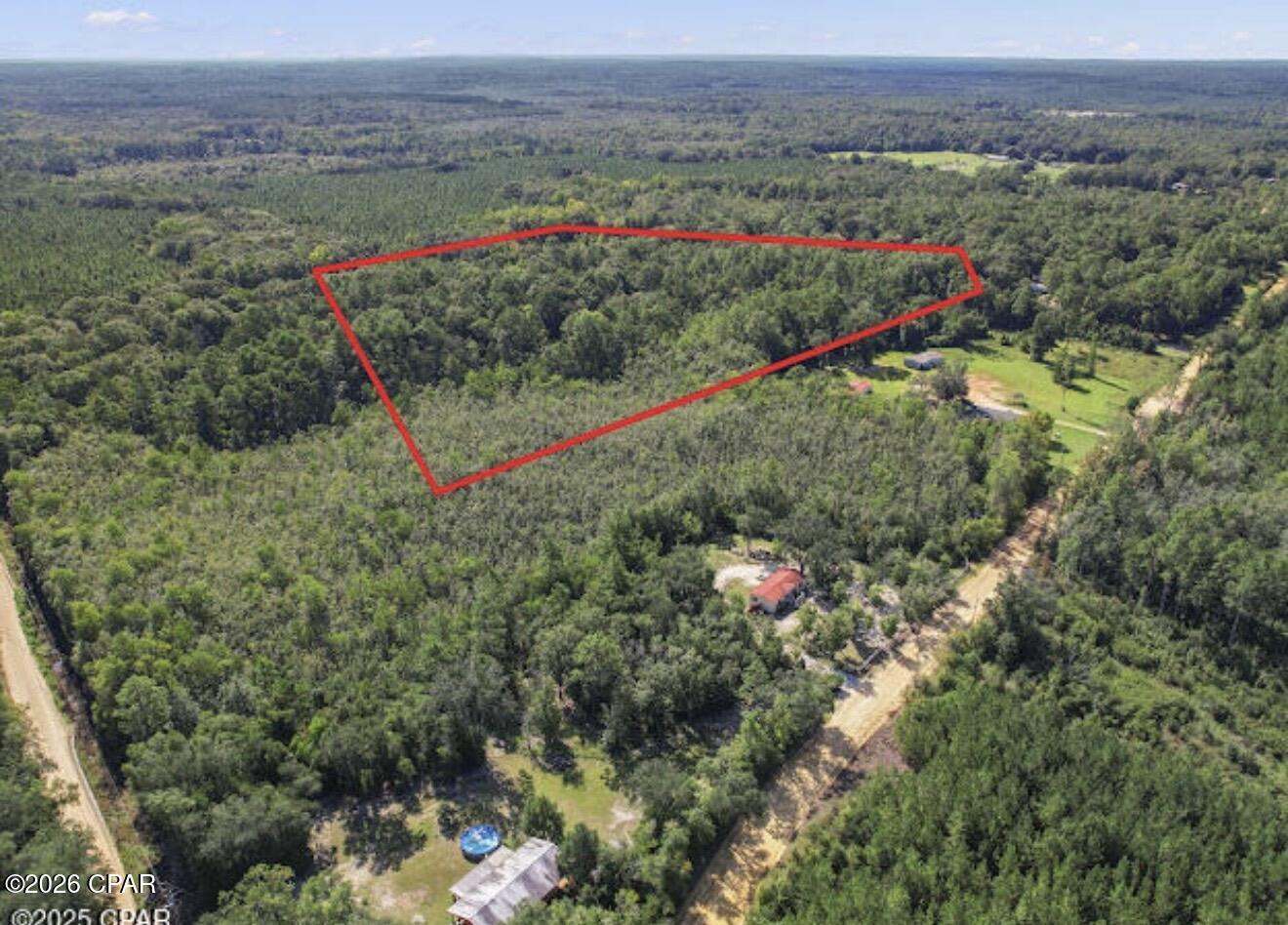 Discover 11.97 acres of privacy and potential tucked away on quiet St. Marys Road in Caryville Florida. This beautiful property offers a mix of open space and natural woods, giving you the perfect canvas for your dream home, family farm, or recreational getaway. With nearly 12 acres you will have plenty of room for horses, gardens, or simply enjoying peaceful country living. Conveniently located just minutes from 1-10 and Highway 90, you can enjoy the best of both worlds easy access to local towns with the tranquility of a rural setting. All measurements are approximate and should be verified by buyer.