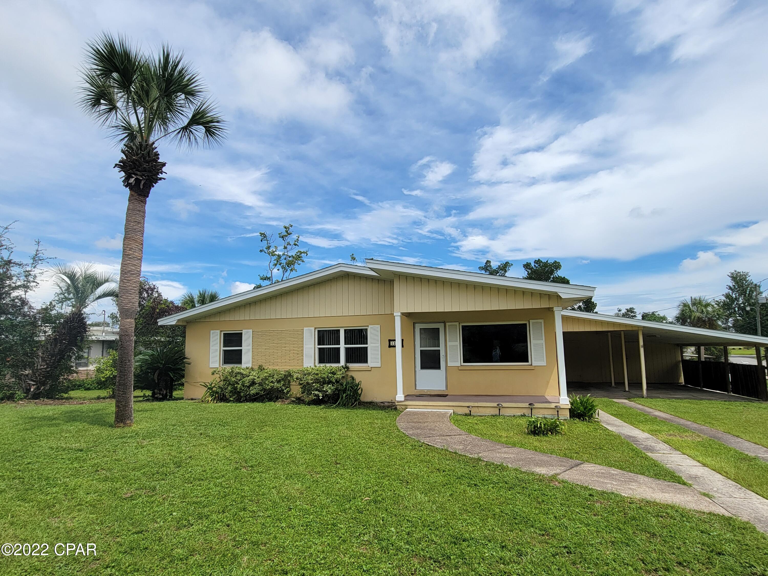 CURRENTLY UNDER CONTRACT, SELLER WILL CONSIDER BACKUP OFFERS-Charming home located in  the desirable St. Andrews area of Panama City. This home is spacious and features 4 bedroom, 2 full bath. Split floorplan situated on a corner lot.  Oak hardwood flooring in a portion of the home. Spacious 18x19 family room.  Large open deck off the master bedroom. Double pane windows installed approximately 2017. Reroof in 2019, New AC System, water heater, and glass top range in 2022.  Plumbing updated with Pex piping. The interior has fresh paint. Two storage rooms under carport which one  room is dedicated to washer, dryer, and water heater. This home is conveniently located near recreational parks, shopping, restaurants, schools., marina, and St Andrews Bay.  All measurements and square footage ar