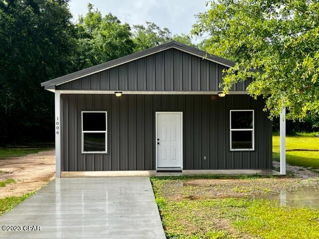 BRAND NEW CONSTRUCTION!!! Home is in the process of being built. All metal is eco-friendly & is 67% recycled. It features a metal roof, metal siding, side by side refrigerator with water & ice maker, central heat/air with heat pump, an electric On Demand water heater, appliances & stained concrete floors. Home meets all current Florida building & energy codes and qualifies for some of the lowest insurance rates in our area! Home features include a 14 x 15 metal outbuilding, spacious front porch, a concrete parking pad with sidewalk & side entrance for convenient unloading of groceries into the kitchen. Additional adjacent parcel is included in the sale.