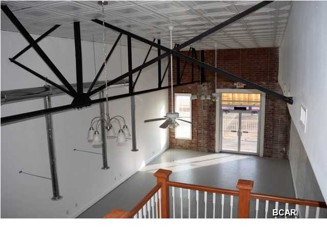 Completely renovated, very attractive corner business location with excellent visibility and curb appeal. Traffic count is approximately 10600 per day on Harrison Avenue and 10500 per day on 11th Street. The unit measures 20 x 49 on the ground floor and has a 15 x 17 loft. No detail was overlooked during the upgrade of this building. Decorative features include tin ceiling tile, exposed brick, ceiling fans and wood finishing touches salvaged from the old Bay Line Railway Station. Loft features attractive stairway,multi-purpose room, kitchen area and bath. Building has 10 inches of spray foam ceiling insulation, low E windows, 3 phase electricity, tank less water heaters and ADA compliant bathroom. Unit B features 5 top of the line ventilation hoods which meet code for a ten table