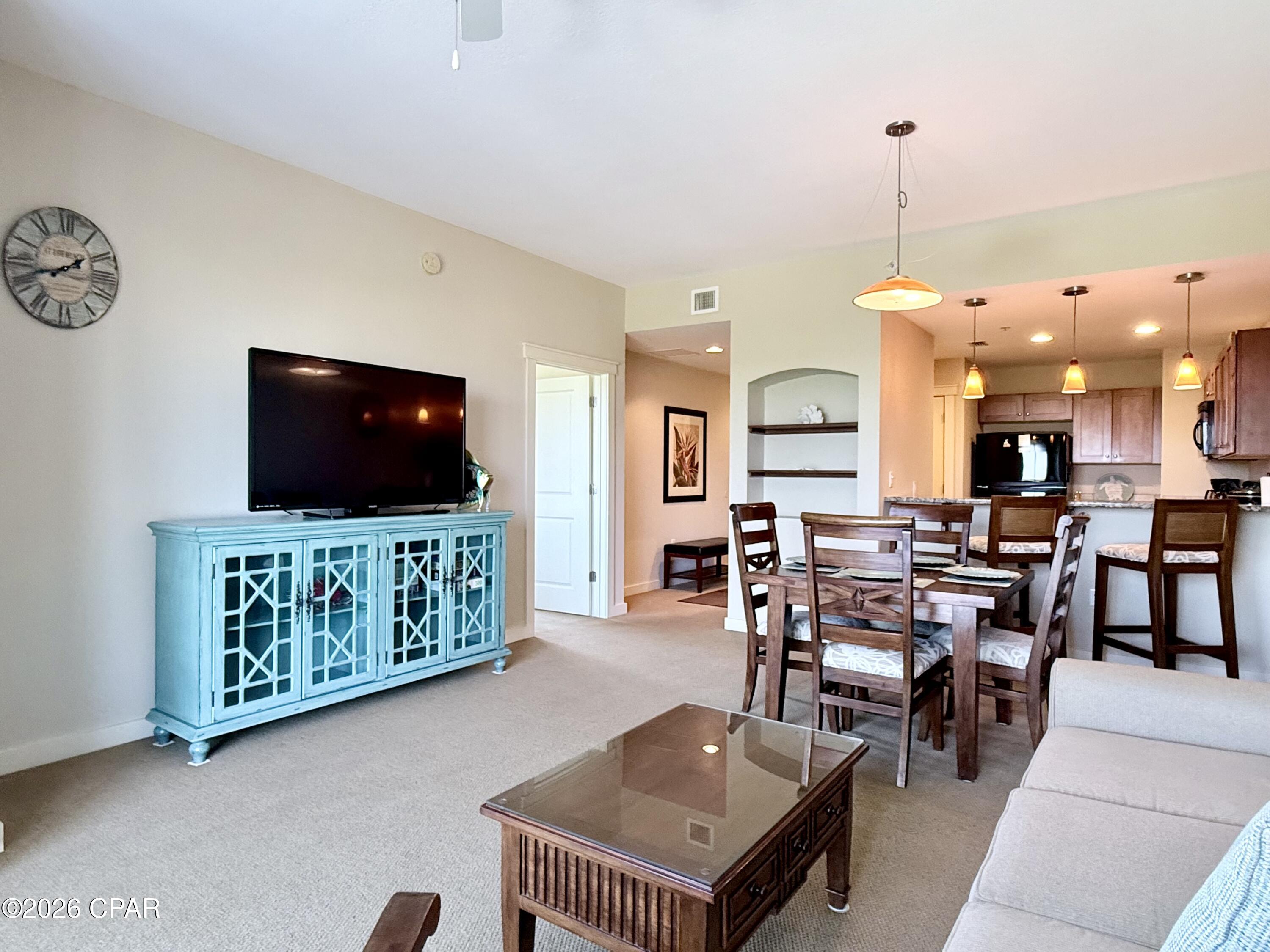 Origin 627 is a 1 bed, 1 bath condo on the back east corner of the building offering Sunrise and Gulf views from the balcony and bedroom.  It is currently the best priced 1 bed unit in this amazing resort!  Bought new by the current owners, and NEVER RENTED!  This is one of the cleanest, untouched condos in the building.  The appliances are in perfect condition, the carpet still looks new, the paint is pristine, furniture is immaculate, the window treatments look brand new, and everything works just as it should!  The balcony has also recently been repainted.  The owners have added some new decor, and several pieces of new furniture, as well as, a recently replaced hot water heater.  This property is being offered fully furnished all the way down to the linens and dishware.  It is ready for you to add your personal touches to it and call it home, home away from home, or add it to your new, or growing, investment portfolio.  Origin is one of the very few high-rise condos in PCB to offer interior corridors, keeping you safe and dry during inclement weather. 

Origin is located across the street from Sharky's beachfront restaurant and bar, and within walking distance to Pier Park, and a multitude of dining and entertainment options.  Origin offers many amenities including two BBQ grill/picnic areas, a heated pool, hot tub, theater, game room, laundry facility, vending, a gated community with 24-hour security, a Sunsations beach store located on the ground level, and the new Beaches and Cream convenient store offering eats and drinks right on property.  If you're in the market, don't miss the opportunity to see Origin 627 in person.  Give me a call anytime for your personal viewing, and see for yourself how clean and impressive this property truly​​‌​​​​‌​‌​​​​‌​​‌​​​​‌‌ is!