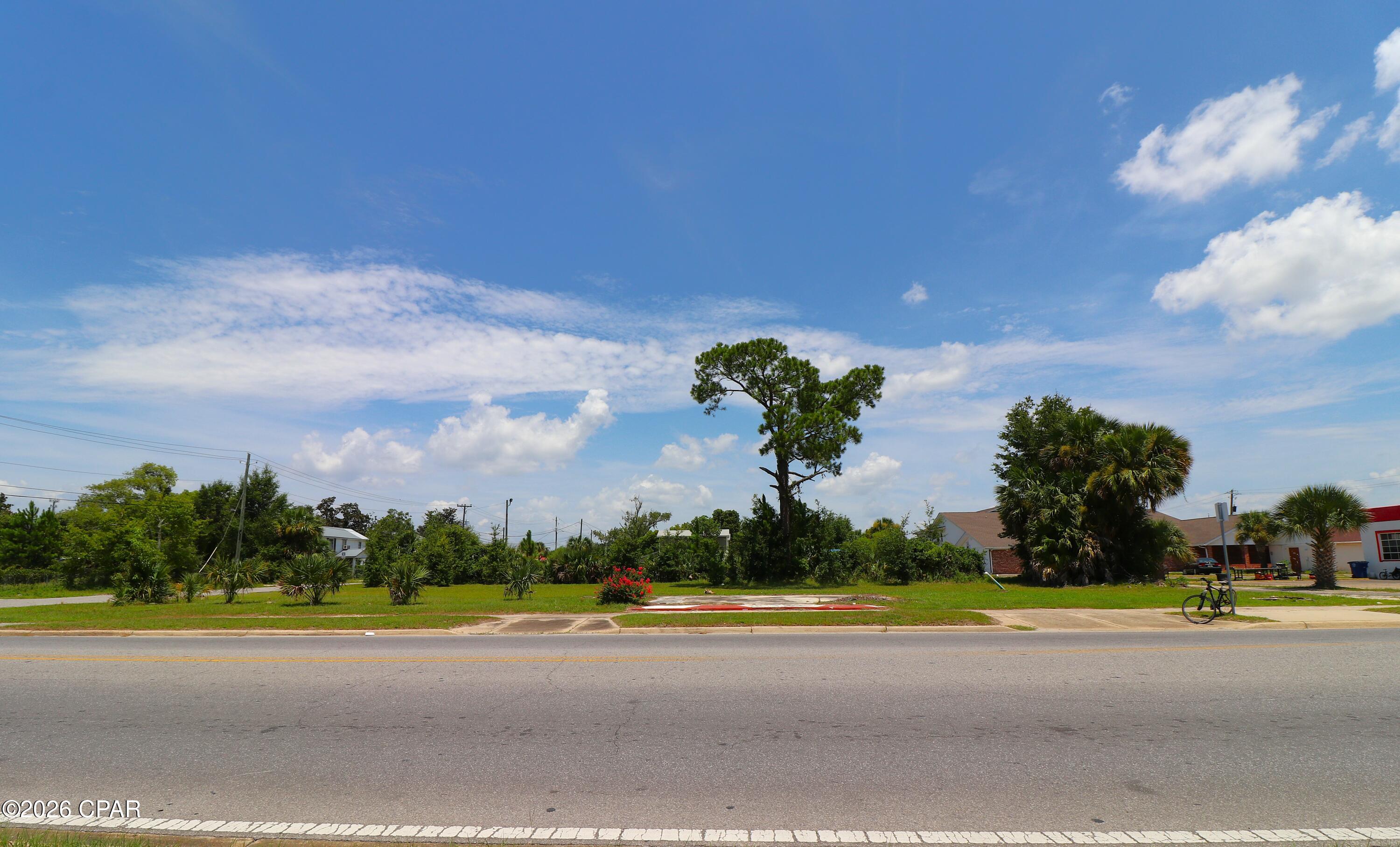 Perfect opportunity for new development with this .298 acre corner lot at 93 x 140 ft!  This lot is cleared and centrally located in the Downtown Panama City area, offering high visibility and heavy traffic flow as well as easy access from 11th St., Grace Ave., and offering alley access as well.  
Good elevation, located in the X flood zone.
Sidewalk on the 11th St side of parcel.