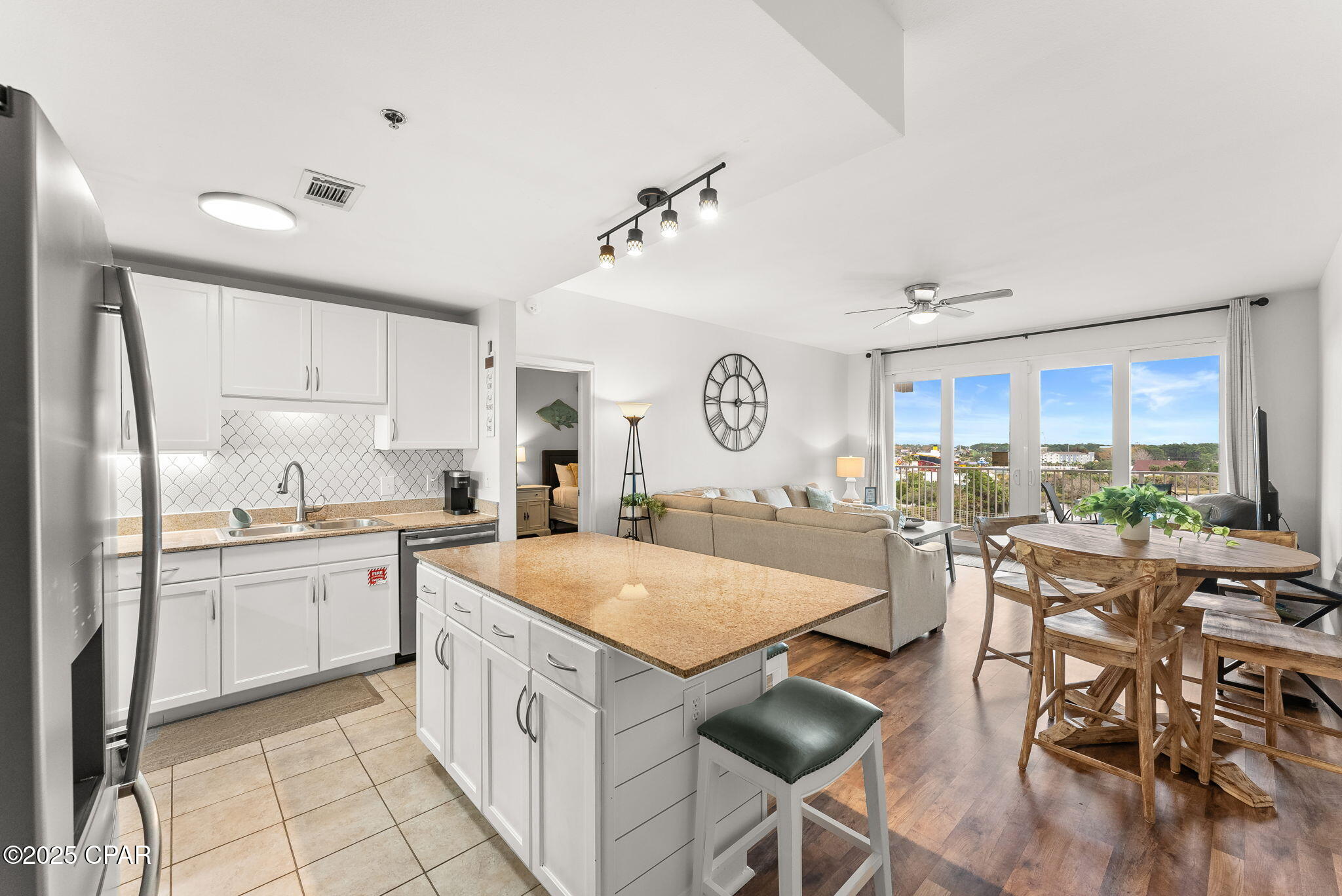 Experience effortless beach living in this renovated, turnkey 2BR/2BA (plus a bunk space) condo at Laketown Wharf Beach Resort, offered fully furnished and rental-ready. Designed to sleep 8 comfortably, this stylish retreat features a private balcony with a lake view, perfect for morning coffee or sunset unwinding.

Guests will love resort-style amenities just steps from the iconic white sand and emerald waters—including five unique pools, a kids' playground, Splash Bar & Grill, fitness center, and covered garage parking. Whether you're seeking a vacation getaway or income-producing investment, this condo truly has it all.