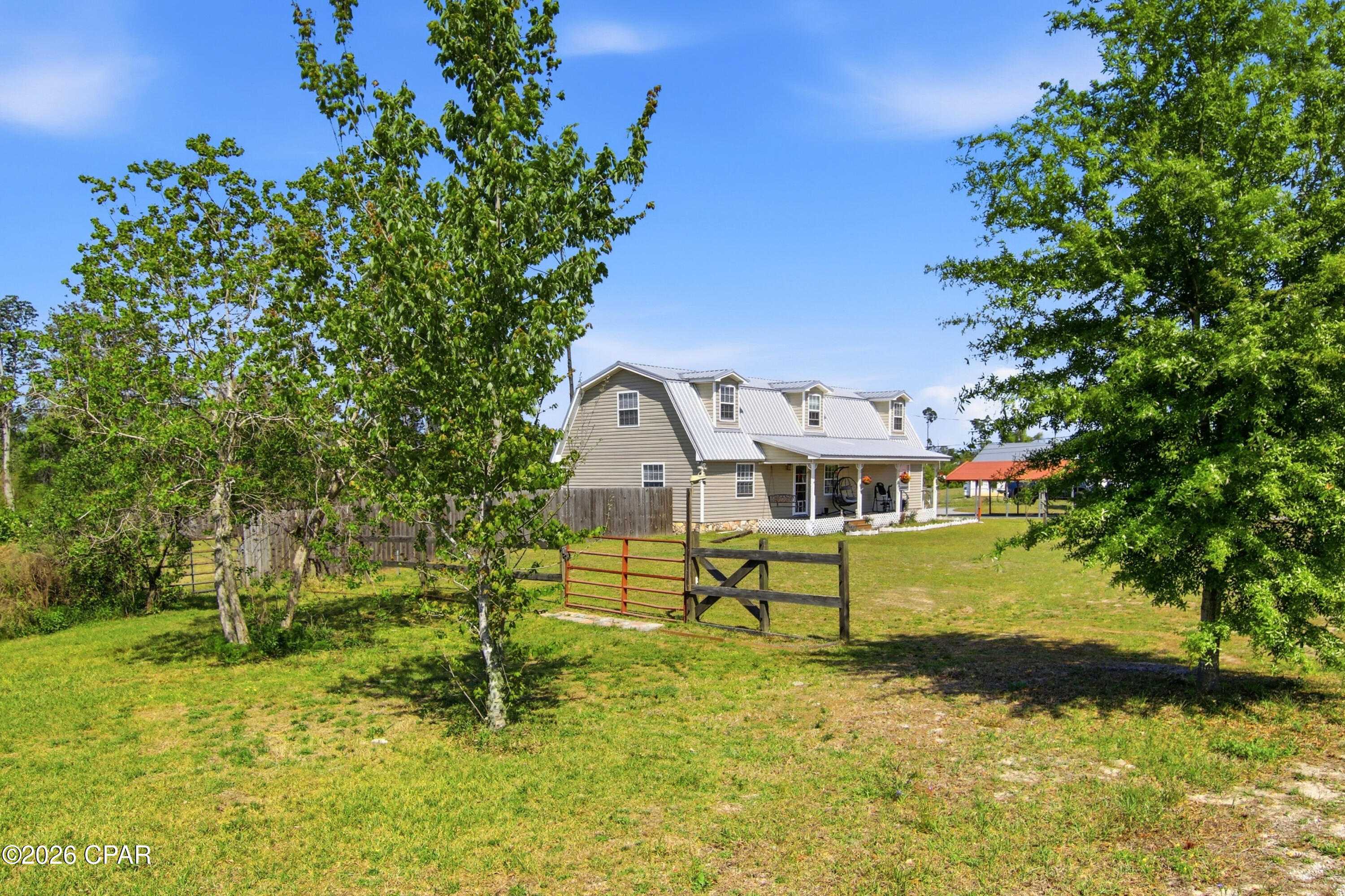 If you've been dreaming of space, privacy, room to breathe, with No HOA, this may be what you are looking for.  Situated on 1.48 acres, this 3-bedroom, 2-bathroom home offers a comfortable blend of space and convenience.  With approximately 2,052 square feet, the layout features the primary suite on the main floor, along with the living area, kitchen and dining room.  The dining room includes a door leading to the back yard allowing for flexible use to suit your needs.  Upstairs offers two additional bedrooms, a bathroom, plus a large bonus room, perfect for a game room, home office or extra living space.  Whether you're looking for extra elbow room, a place to spread out, or looking for that 'country living feel' without being far from town, this property is worth a look.