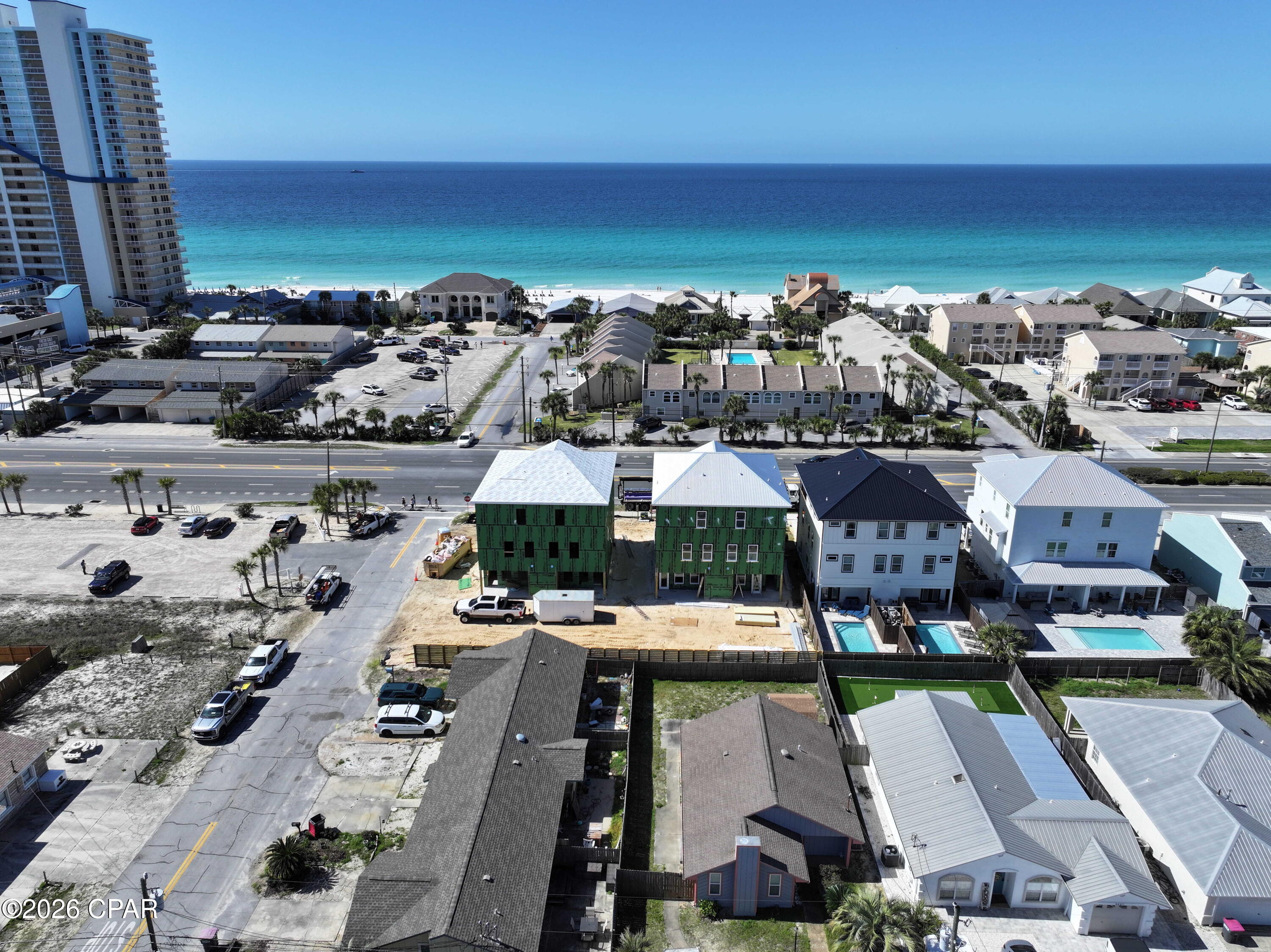 NO RENTAL RESTRICTIONS!!! 
This limited collection of vacation homes offers an exceptional opportunity to own in one of the area's most sought-after locations -- literally across the street from the sugar-white sands and shimmering Gulf waters.
Each home showcases spacious, open-concept designs with 4 bedrooms, 4.5 baths, and a bunk room. Enjoy high-end finishes, stylish coastal architecture, and your own private pool -- the ultimate spot for relaxing or entertaining after a day at the beach. Expansive covered porches invite you to take in stunning sunrises and sunsets in true coastal style. Close to popular restaurants (walk to Schooner's), shops, golf courses, and water activities, this community also offers convenient access to Panama City proper and the Northwest Florida Beaches International Airport.