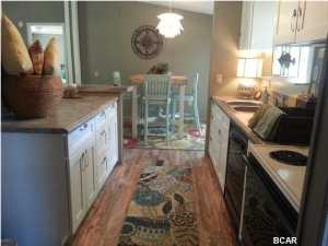 Adorable quaint little home located very near St. Andrew Bay in Magnolia Beach! Renovated and ready for a new owner. It has three bedrooms, two baths and features a fireplace,large deck,enclosed patio, and a precious little green house.(all dimensions are approx., buyer please verify)