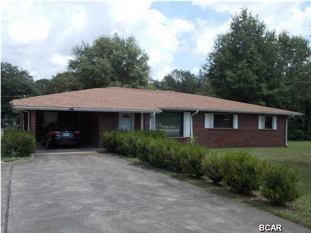 Beautiful home with lots of space to entertain. Two kitchens, two Master Bedroom suites, a family room, air conditioned florida room, a huge utility room and lots of storage space. There is a security system as well as remote controlled gates. The yard is about an acre and has a four-stall carport at the back with a work room. Close to schools and shopping. Must see! Priced to sell quickly!