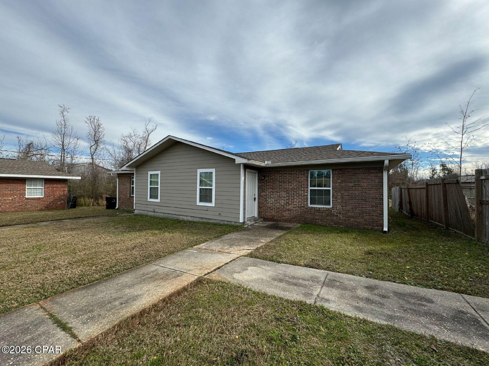 This unit is a 2 bedroom and 1 bathroom end unit. Close to Rutherford High School, convenient to Tyndall AFB. Private entrance, shared back patio space. NO PETS. Quarterly pest control service and yard service included in rent. Application fee will be credited to 2nd months rent.