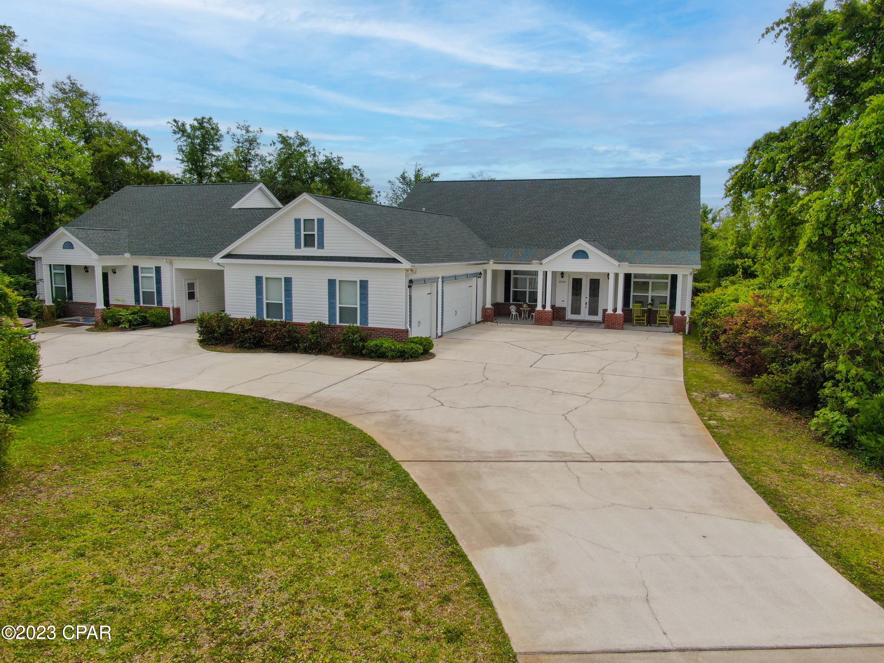 BEAUTIFUL HOME WITH 3 CAR GARAGE + GUEST HOUSE WITH CARPORT + HEATED POOL - GREAT FOR ENTERTAINING! The interior of the main home features 4 bedrooms + bonus/craft room, 3 full baths, 3,501 SF on the main floor, a 499 SF 2nd floor Loft, a large living room with Opti-Flame electric fireplace, a secondary living room/game room with wet bar & ice maker, and a HUGE kitchen with custom cabinets, XL island with breakfast bar, a gas range and a walk-in custom pantry. The master suite has 2 XL walk-in closets, an adjoining bath with his and her sinks, a large walk-thru tiled shower, and a Max Pearl whirlpool tub. The other 3 bedrooms are good size. The 3-car garage has two large storage closets and ample added storage above the garage. The 1,364 SF guest house is attached to the main home by a carport and features 2 bedrooms with large closets, 2 full baths, a large laundry room and an open kitchen/dining/living concept. This set up is perfect for different types of live-in situations. The exterior features a heated 6' deep in-ground pool with spa, an XL driveway, a covered front porch, a covered back patio (complete with built-in gas grill), a hot&cold outdoor shower and a fenced backyard. ADDED FEATURES: Newer Roof (comes with a 50 year Shingle Warranty), 3 New HVACs, 35KW natural gas whole house generator (has its own gas meter), Watt Sound wired sound system (includes outdoor speakers on back patio, front porch and garage), ADT Security System, Termite Bond, HVAC yearly maintenance, high ceilings with 8' doors, well for sprinkler system, newer pool liner with recent resurfaced pool deck, both houses wheel chair accessible (excluding loft) and more! This home has so much to offer and is located at the end of a street surrounded by trees for added privacy. Ask your Realtor for the added feature sheet. Call today for a private preview.