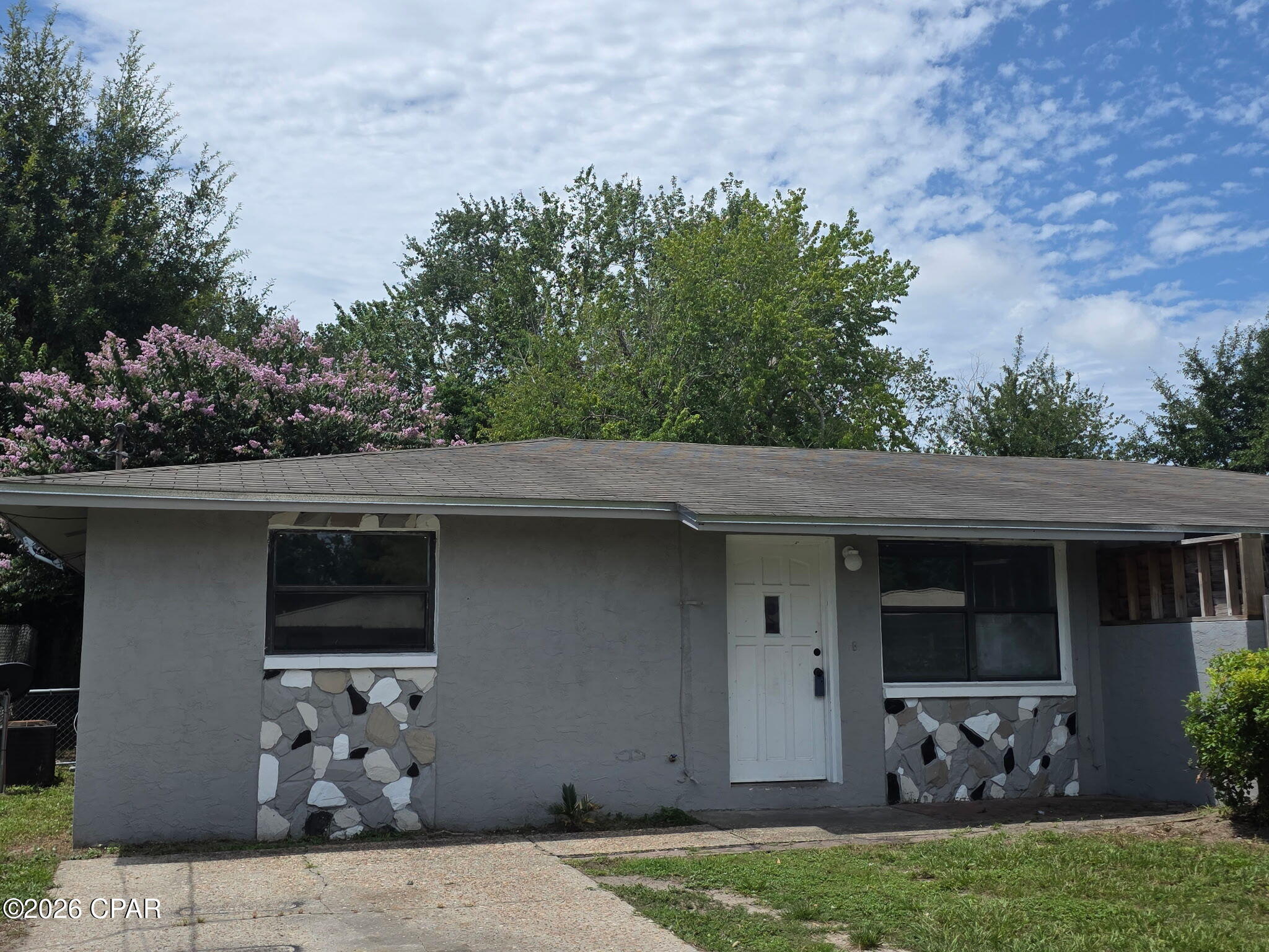 Centrally located in Lynn Haven, this half duplex presents an excellent affordable opportunity for an owner-occupant looking for an affordable entry point and an opportunity to create sweat equity. If your investor looking for cash flow this property has the potential to make that work. 

Outside, the home offers functional amenities that add genuine value, including a beautiful, fully fenced backyard Additionally, a substantial 15×15 storage building on-site provides excellent utility for tenants or extra storage space. Combining a convenient location at a great value this property is a great entry level home or investment.