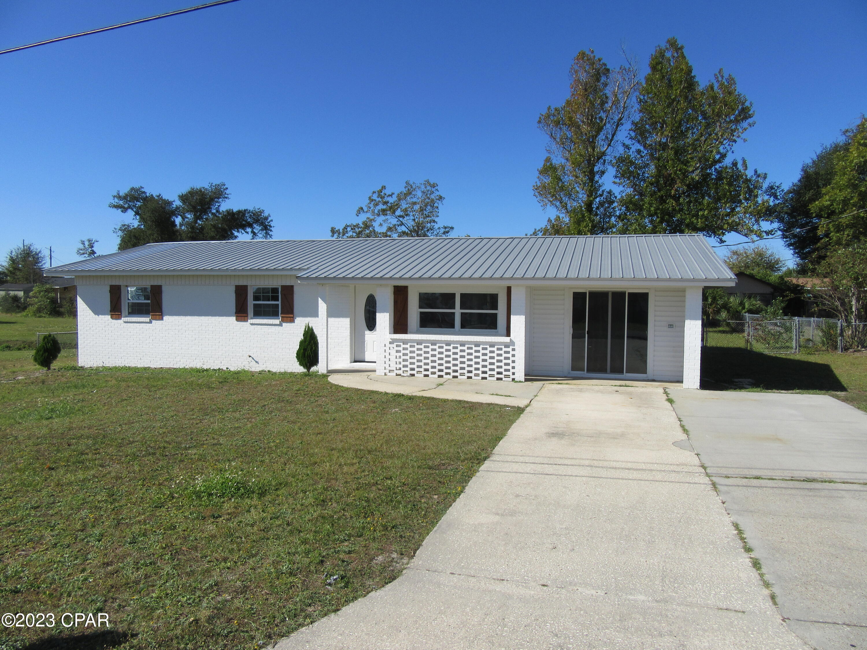This 4-bedroom 2 bath home is located minutes from Tyndall AFB with LVP and ceiling fans throughout. Large, fenced back yard. All electric with refrigerator, Stove and Microwave. Garage has been converted into a large bedroom and home has central heat and air. All property sizes and ages are approximate, please measure and/or verify if important.
School assignments are subject to change, please check with Bay County for most accurate information.
Deposit is the same as the rent. Pets allowed with owner approval and NON REFUNDABLE pet fee applies per pet. Breed restrictions apply.