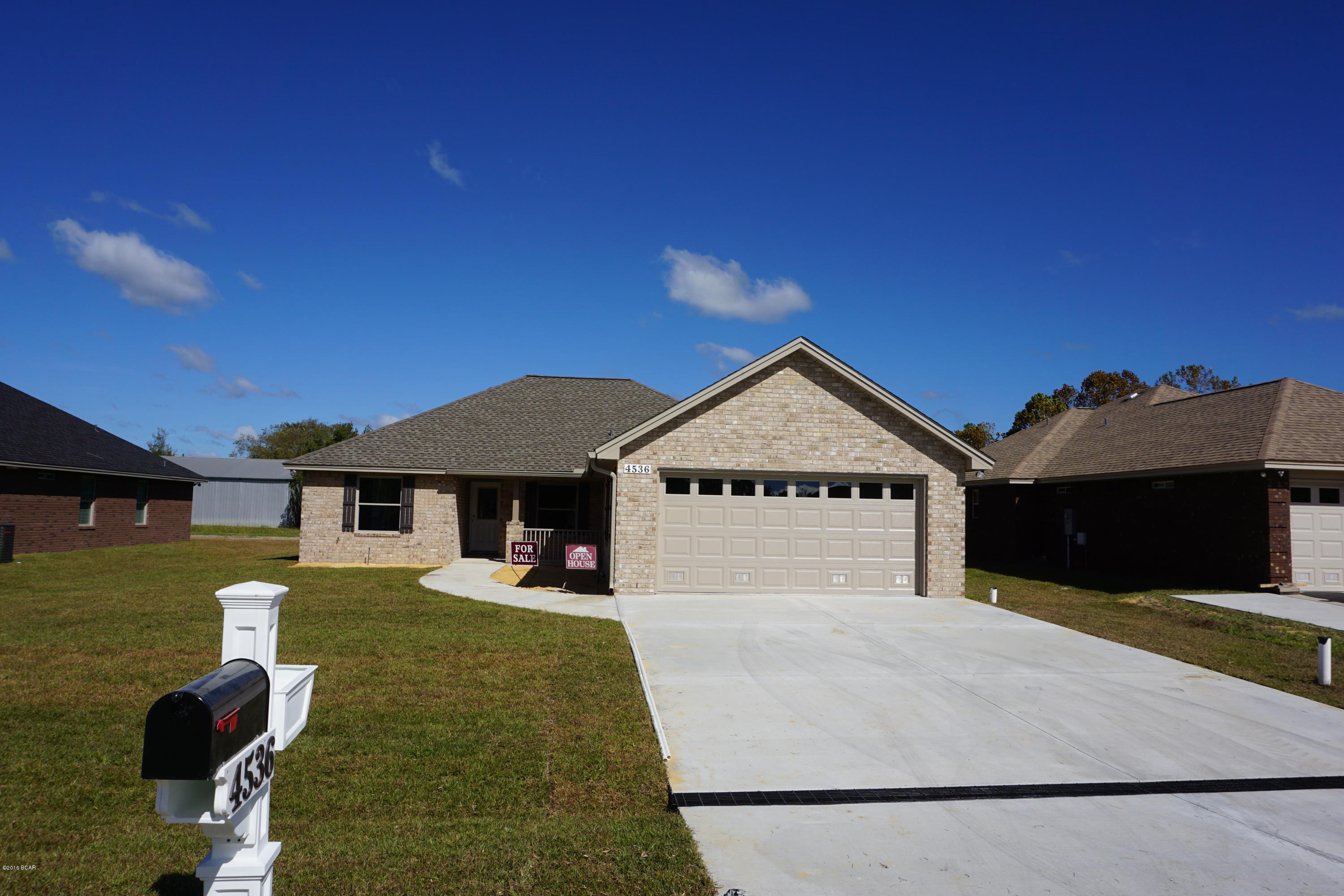locally renowned builder is a Split 3 bedroom 2 bath all brick home with front porch that offers master bath with his & hers double shower with Rain maker (3 shower heads) and shower seats on both ends, and walk in closet. The kitchen is a dream with all real wood cabinets, solid surface countertops, and stainless steel appliances. There are cabinets in the laundry room. Living room with and electric fire place and crown molding. Home comes with a security system and generator ready electrical outlet with cord. Outdoors there is an enclosed screen patio, outside shower and sprinkler system. Home is built to 140 MPH wind code. At Bylsma Manor Estates with many homes already built and waiting for you to tour today. If important measurements should be verified