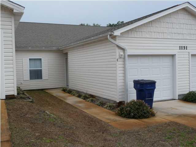 This is a very nice 2bd 2ba townhouse. Centrally located. The eat-in kitchen has an oven/range, dishwasher, microwave, and refrigerator. There is a small fenced yard, washer/dryer hook-ups, open deck, a covered porch, and a garage. Small dog ok, with non-refundable pet fee.
