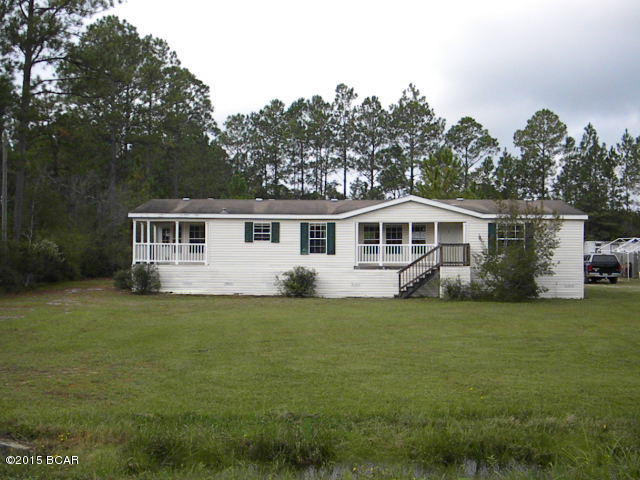Little touch of country in this 1593 sq ft home with 3 bedrooms, 2 baths, just off of a paved road on .68 acre with a split floor plan,  master bathroom with dual sinks, garden tub and separate shower, walk in closet, dining area along with a breakfast nook, good sized living room and roomy kitchen with a lot of cabinets.  Convenient to town and only needing a little TLC to make your own.  Call to see today.