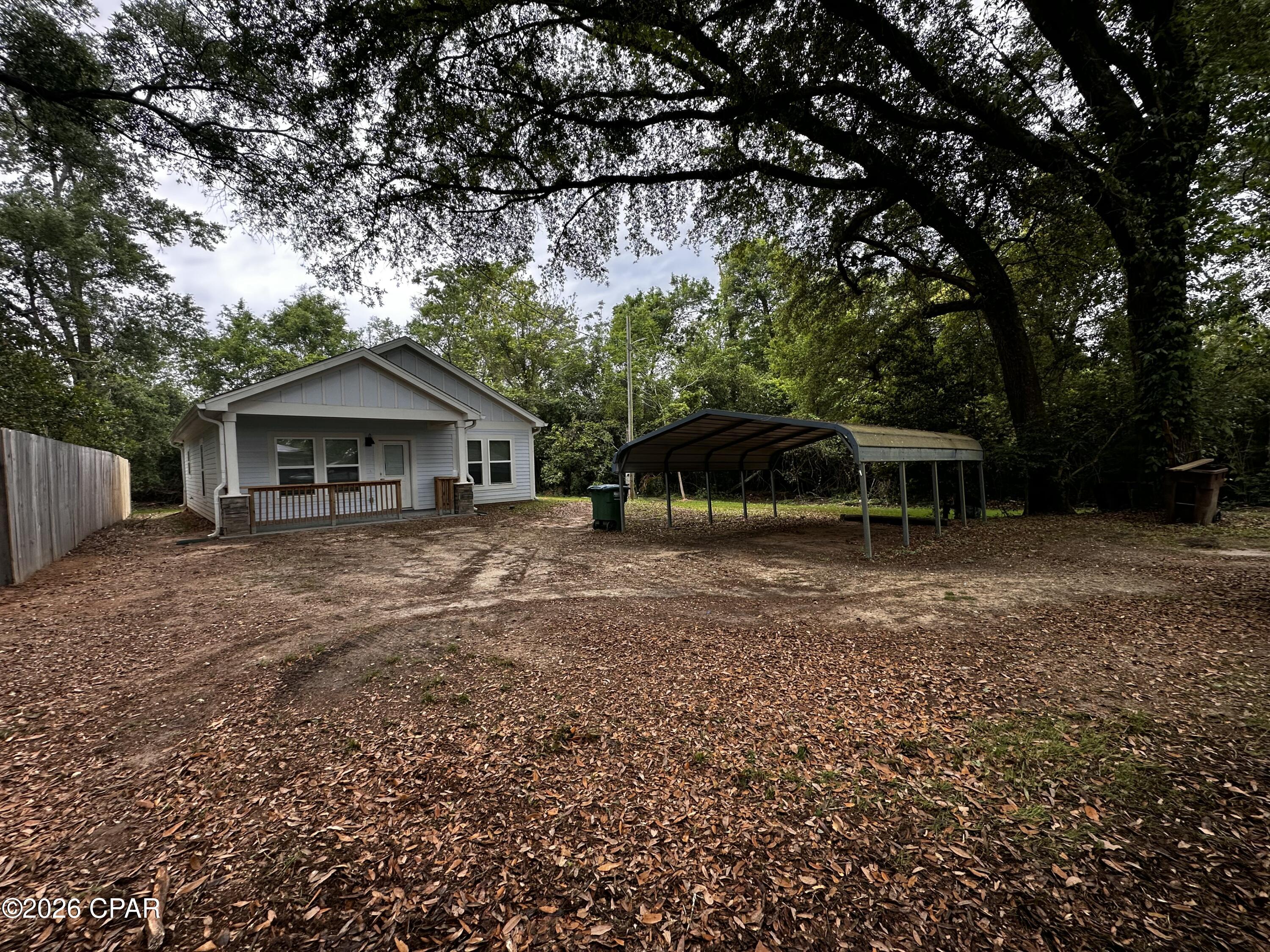 CURRENTLY UNDER CONTRACT, SELLER WILL CONSIDER BACKUP OFFERS. Brand New Feel, Smart Value: Two Bedroom, Two Bath home in Sneads built in 2023 and still feeling brand new! This home offers modern comfort in a secluded setting just off Highway 90 in Sneads. Enjoy a large living area with an open, versatile layout, perfect for daily living or entertaining. 
The property has a mobile home on it that will be removed and cleaned prior to closing.