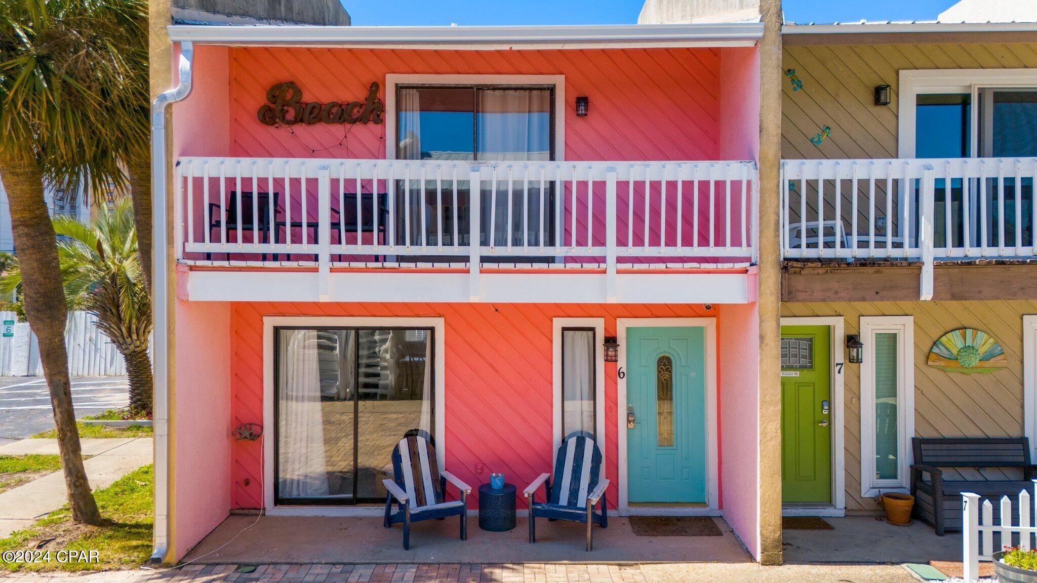 Fully Furnished Short Term Rental! Introducing a stunning attached single unit located at 6404 Thomas Drive Unit 6, this extraordinary property offers an unparalleled coastal lifestyle with its prime location and remarkable features only a quick stroll to access 12 for sandy feet on the beach. Boasting a modern kitchen, two master bedrooms,2 Parking spots that convey and an array of unique offerings, this fully furnished haven is a true gem. With the added advantage of allowing short term rentals and a spacious fenced-in patio adorned with two balconies, residents will relish the ultimate indoor-outdoor living experience. And to top it off, an enticing community pool awaits for a refreshing dip on warm summer days.

This inviting residence showcases a thoughtful layout that optimizes space and comfort. The modern kitchen is a chef's dream, complete with top-of-the-line appliances and ample storage for culinary essentials. Embrace the coastal breeze and enjoy mealtimes in the bright and airy dining area just off the kitchen.

Step outside onto the marvelous fenced-in patio, a private oasis perfect for entertaining or simply unwinding. Savor your morning coffee or relish in breathtaking sunsets on the two charming balconies, offering serene views and a peaceful atmosphere.

Beyond the property's boundaries, residents will delight in the vibrant neighborhood of Panama City Beach. This community is a haven for beach enthusiasts, as it is ideally located just half a mile from the stunning sandy shores. Spend your days basking in the sun, building sandcastles, or indulging in various water activities.
