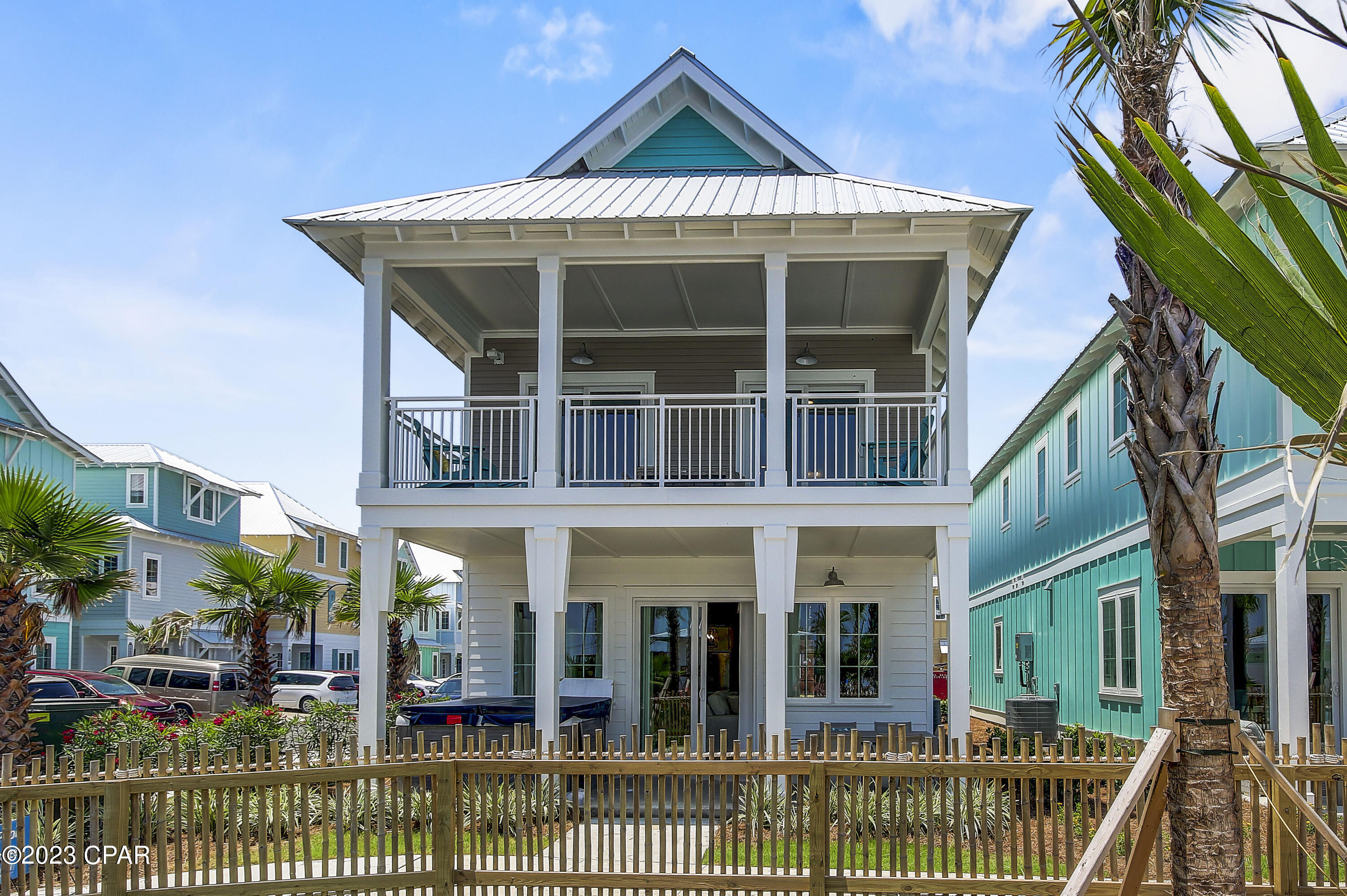 Now is YOUR CHANCE to own at the New Margaritaville Beach Cottage Resort on Panama City Beach!  If you are ready to experience the Florida Coastal Lifestyle - then look no further!  This beautiful beach cottage is the dream home you have been looking for and has never been rented.  This newly constructed  home is just steps away from Panama City Beach in the Margaritaville Beach Cottage Resort.  
Talk about perfect location!  This 5 bedroom and 4 ½ bath home is located right across from the resort pool that includes a sprawling lazy river, pickleball courts, 580 feet of dedicated beach access, selected beach services and so much more.  Imagine lounging by the pool with your meal brought to you or sipping the perfect cocktail on your patio with the sea-breeze in your hair.  This can be your forever home on the beach or the perfect property for a vacation rental.  Margaritaville Beach Resort does allow short and long-term rentals.  Call your favorite realtor today for a private showing before the opportunity to own at Margaritaville is gone!