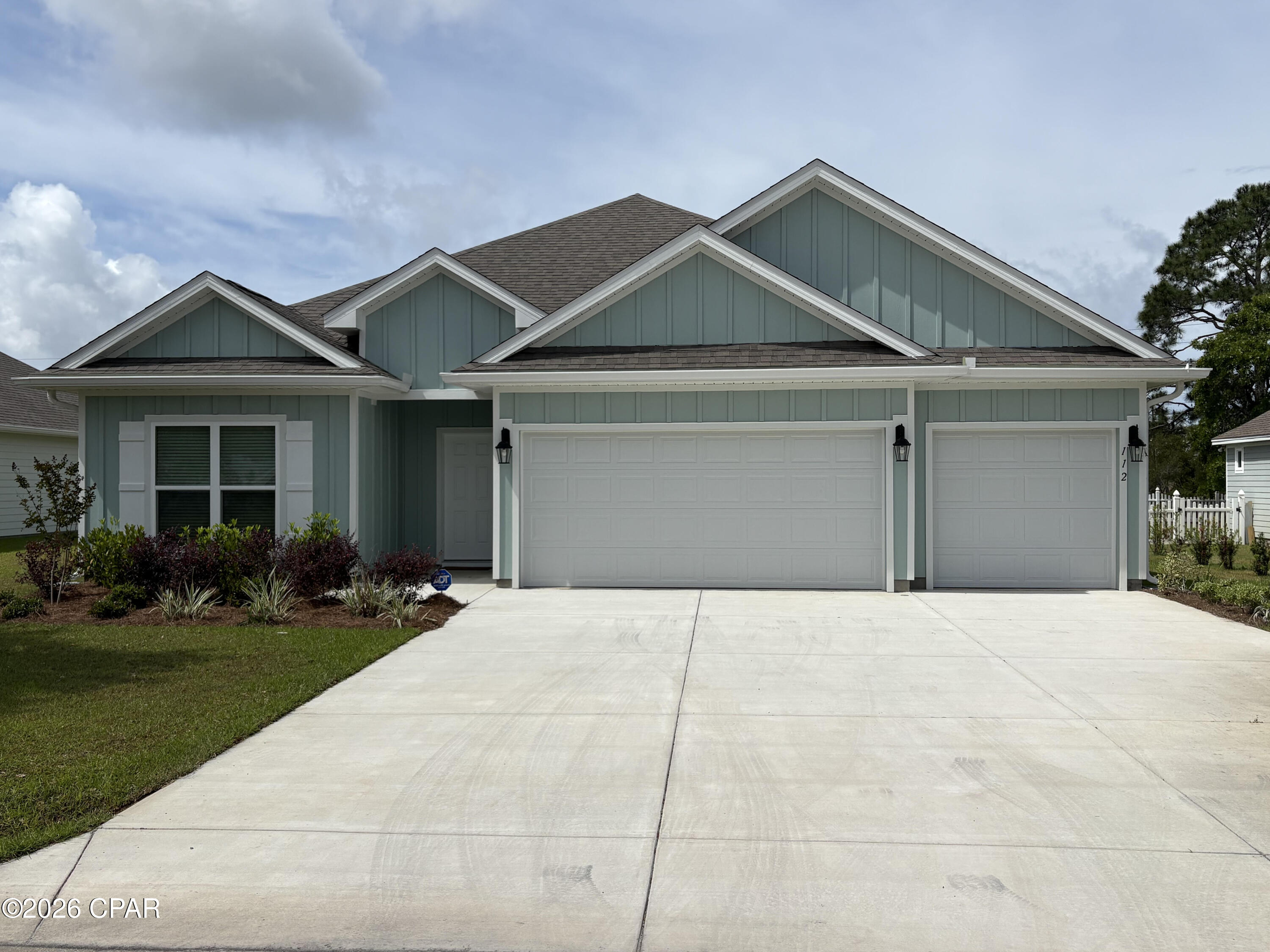Located in the peaceful Heron Walk subdivision is a rare opportunity to own a like-new home that has seen very minimal use, and is still under the builder's one year home warranty until June 2026. This 4 bedroom, 3 bath, 3 car garage, craftsman style home, with over 2300 square feet of heat and cooled living space is ready for you to call home. It's open floor plan is perfect for any family size big or small and will be great for entertaining and family gatherings. The home is equipped with modern smart technology and a ADT security system for your convenience and peace of mind. The kitchen and bathrooms have mission style white cabinets and beautiful granite countertops, and the kitchen features a large island, spacious walk-in pantry, and all appliances convey to include stainless steel whirlpool smooth top stove, refrigerator, microwave and dishwasher. In the spacious laundry room a new washer and dryer has been provided and thee is shelving for storage. For those warm summers and cool winters there is a Carrier central air conditioning system, and the 50 gallon hot water heater is equipped with a recirculating system. Durable, low maintenance, engineered vinyl plank flooring is throughout the home in every room. The living area features a tray ceiling with crown molding as does the master bedroom. The dining area is spacious and can easily accommodate a large table and seating for eight or more. Adjacent to the kitchen is also space for a breakfast nook. The master suite is very spacious and relaxing with duel vanities, a soaker tub, large shower, and private toilet room, and adjacent to the bathroom is a spacious walk-in closet. The three guest rooms are of good size and each has it's own spacious closet. Outside is low maintenance landscaping and a fully sodded yard with room to add a pool and fire pit if desired in the back yard. A shallow well has been added and connected to the 6 zone Hunter irrigation system for substantial savings on lawn irrigation. Durable low maintenance Hardie Board siding covers and protects this beautiful home in a coastal sea blue color with white trim and vinyl eaves. A covered front entry and spacious back covered porch rounds out the 3100 total square feet under the roof. Heron walk subdivision is located near schools, college, sacred heart hospital, bike and walking paths, and only 3 miles from the downtown shops and restaurants. Current home owners insurance is only $1026.20 a year, flood insurance is not required, and there is no HOA fee in Heron Walk Subdivision. There is a termite bond on the home as well.  Some furnishing are available for purchase ask if interested. Sellers are licensed real estate sales associates in the state of Florida.