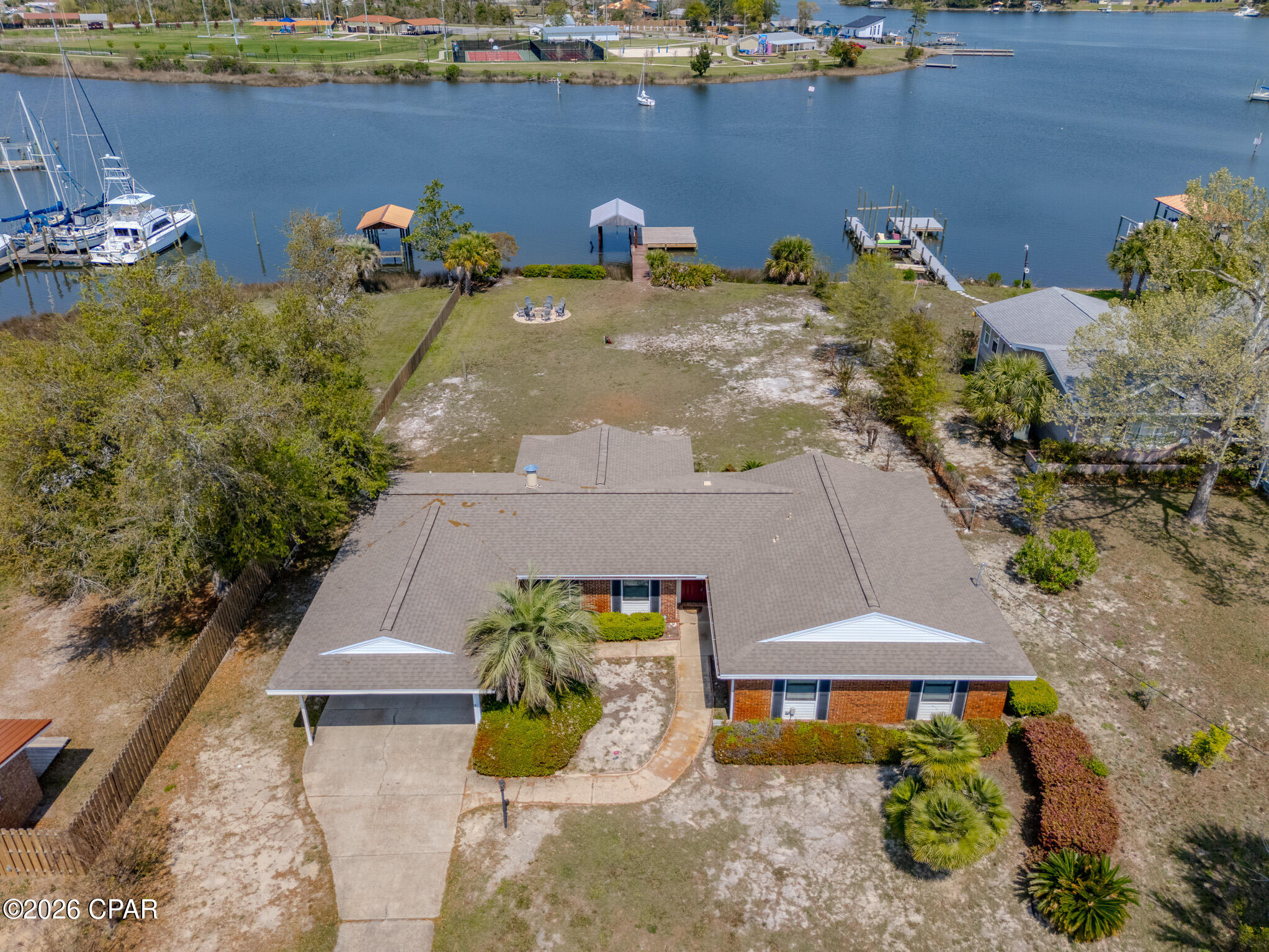 Waterfront living at its best on Callaway Bayou! This charming 4-bedroom, 3-bath home sits on an oversized 0.67-acre lot with direct, unobstructed access to the Gulf (no low bridges to limit your boating adventures.)

Enjoy the extended dock and boat lift, making days on the water effortless. Inside, the home offers a cozy, inviting feel with multiple water views from the living room, kitchen, dining area, bringing the outdoors in at every turn.

The covered patio and spacious yard provide the perfect setup for entertaining or relaxing by the water. Offered furnished with an acceptable offer, this is a true turnkey opportunity for full-time living or a waterfront getaway.

If you've been waiting for the perfect blend of charm, space, unbeatable water access at a GREAT price..this is it. Call your Realtor today to schedule a tour!
