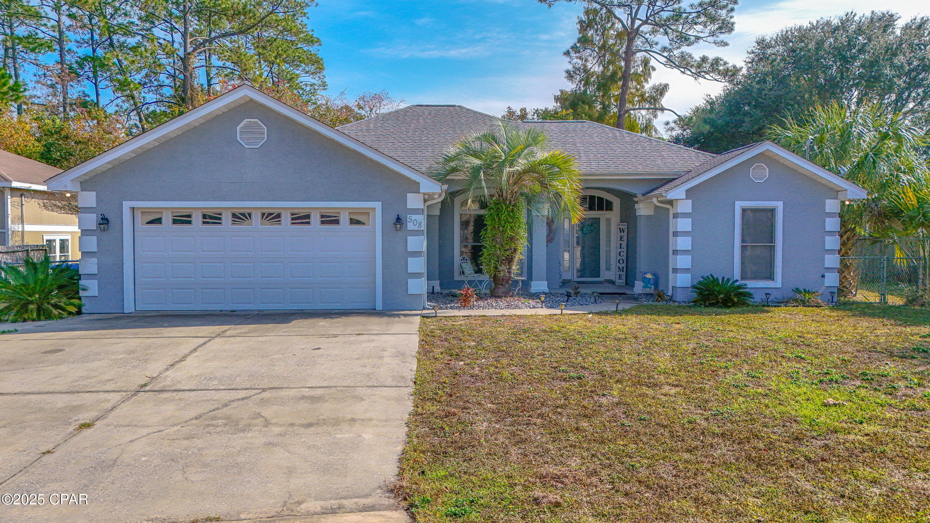 Beautiful  3 Bedroom 2 bath split plan home with tons of natural light . This house offers a large living area , with dining room and kitchen area complete with a great  breakfast bar. The bedrooms are large and roomy , the master is located on one side of the home with large walk in closet and seperate shower and bath in master bath. The other end of house has two other bedrooms with a full bath. Leading out the sliding door off the living room you will find a cozy 3 season porch as well as a out door covered patio for grilling and chilling .The  2 car garage is perfect for secure parking PLUS a separate outdoor building thats perfect for a workshop, hobby room or extra storage. Situated on a private lot with NO HOA & Short Terms allowed. You will enjoy the freedom to personalise your space without restrictions . Large and roomy this home creates a perfect year round retreat or a second home ideal for relaxing and entertaining! This home is close proximity to the sandy white gulf , airport, shopping and more!! Call your favorite Realtor to check out this beauty today!