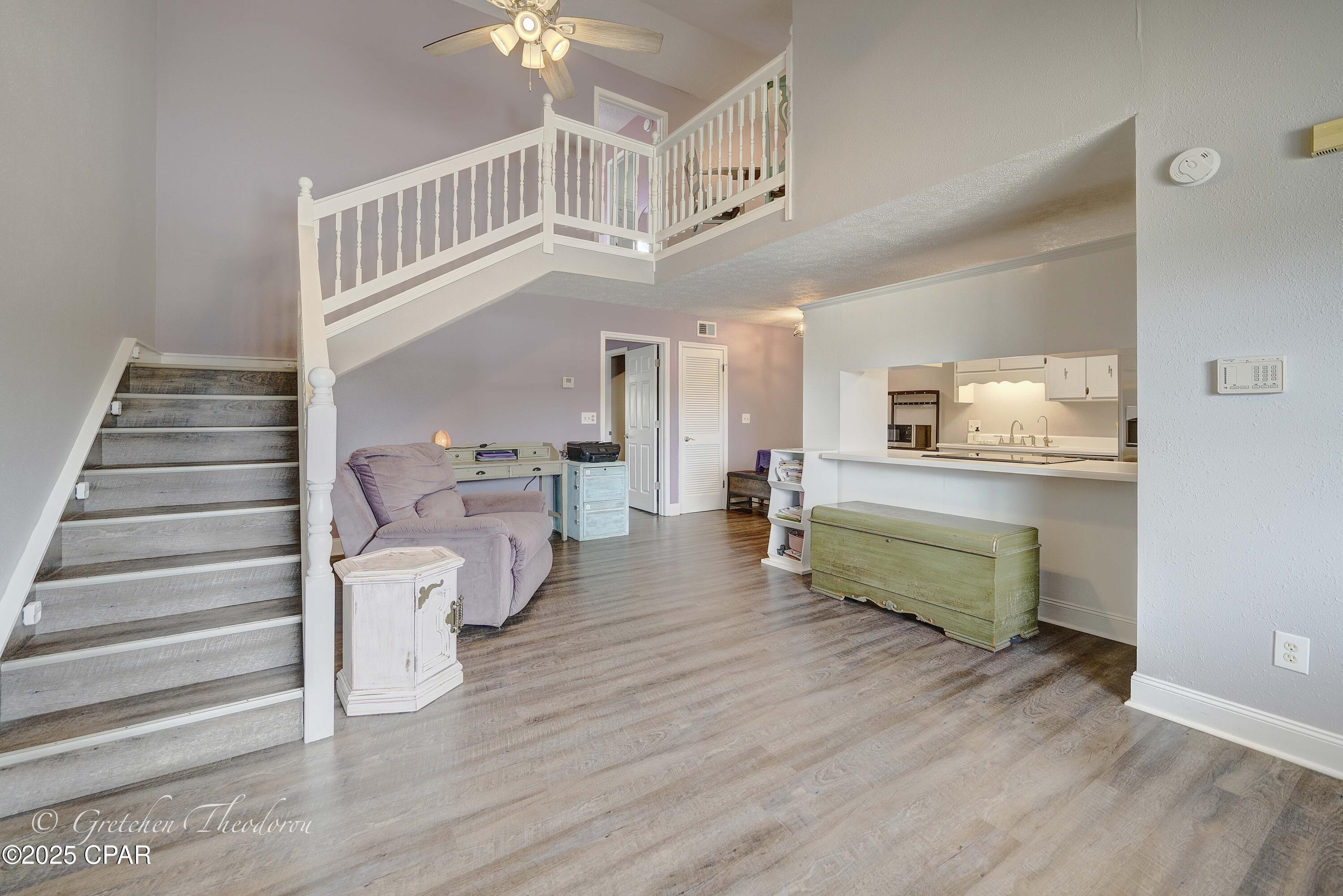 Beautiful townhome located in Panama City! Renovated with GORGEOUS vinyl plank flooring, new paint, appliances, vanities, and more! With tall ceilings, ample storage, large closets in both bedrooms, full sized laundry room and a wonderful layout, every room is spacious and open. Complimented with a beautiful wrapping staircase that overlooks the living space. Master suite opens with French doors into the open Florida room adding an additional 219 sq ft of living space, which is so versatile it can be used for anything! Enjoy the outdoor space with the full privacy fenced backyard! Set up your showing today! Call your agent to view this amazing home!