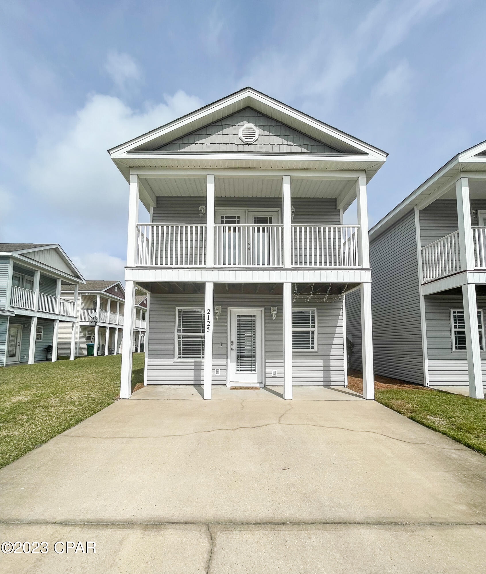 This two bedroom 1.5 bath townhome is located in a gated community with pool access, a pond with water feature and has WiFi ring and e-lock included,.  As the tenant would have access to the accounts.  Large, open downstairs with living area, dining and kitchen with plenty of counter space and cabinets. The stainless appliances are really nice and the entire downstairs is tiled.  Very friendly for your fur babies!   Out the back door , is a covered patio for grilling or hanging out.  Upstairs you will have two bedrooms each with their own balcony plus, a full bath with tub/shower combo and laundry with a stackable washer and dryer.  This home is in a wonderful location, close to the Hathaway for ease of getting into town, over to Thomas Drive or Back Beach.

$40 application fee per adult
The owner will manage the property.  
I am only assisting with listing, securing a tenant and signing the lease.  After that, the tenant will deal directly with the owner.
All monies will be paid to and held by the owner.
Rent and Deposit needed to  move in
Pets (no more than 2) allowed with $300 Non Refundable Pet Fee.  Pets must be on a leash at all times and must be picked up after.  There is an HOA and the rules will be provided to the tenant.
Two designated parking spots directly in front of the home.