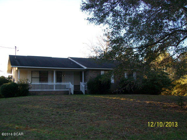 ENJOY BEAUTIFUL SUNSETS ON SUN LAKE in BONIFAY!. Cute 2 Bedroom 2 Bath With aprox 1344 Sq Ft. Office/Den overlooking the water can be easily a third bedroom! Screened porch overlooking water. Located on 1.35 acres. Sun Lake is an 80 acre Bass Lake. Pier and dock to fish on! Shed with Carport in backyard. Located at end of the street with little traffic. Call today for your personal showing!!**PRICE REDUCED!!**