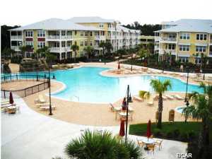 Best price in Island Reserve. Financing Available at this great Low Price.The most sought after gated Community that is not directly on the Beach. Close to the Hathaway Bridge and Navy base a couple miles to Beach and easy access to Panama City Beach Parkway. A very central location Upgrades galore including all Granite countertops, Bamboo wood floors, stainless steel appliances lots of storage. Large covered Patio and a courtyard with fountains and flowers and benches to mingle with friends. See the one acre pool from your oversized balcony enjoying incredibly beautiful upscale pool furniture around it. The gym is fully equipped with only the best equipment and the air conditioned inside Basketball court is a popular amenity as well. Your car will always be out of the sun because