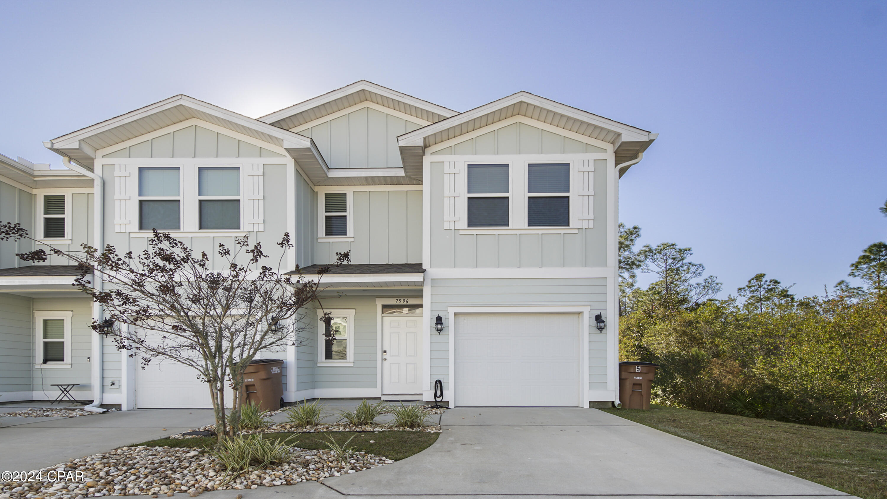 Available now! Pet friendly, 3 bedroom/2.5 bathroom townhome w/community pool! Come enjoy the maintenance free lifestyle of Hathaway Townhomes w/yard service provided! As you walk in you'll love the luxury vinyl plank flooring & overall spaciousness of the home. Downstairs features a large kitchen w/granite counter tops & stainless steel appliances, enormous living room w/ dining area & a half bath. Upstairs you'll find an extra large master suite w/inviting bathroom featuring double sinks, walk-in shower & linen storage. The other side of the upstairs boasts a laundry room w/full size washer and dryer, spacious full bathroom & two bedrooms that have nice size closets. This townhome is minutes to the beach, Pier Park, restaurants, & more! Available now!