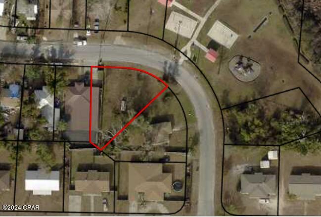 Explore a prime residential opportunity in the heart of Panama City! This 0.133-acre lot, measuring a generous 52x112, awaits your vision for a new home. Zoned R-1 for single-family use, this cleared, pie-shaped lot is strategically located for optimal walkability to Bay High School and the vibrant Harrison Avenue downtown area. Take advantage of potential benefits in one of Panama City's Opportunity Zones. With easy access to shopping and dining, this unique property is perfectly poised for your dream home. Seize the opportunity and envision the possibilities in this central Panama City locale.