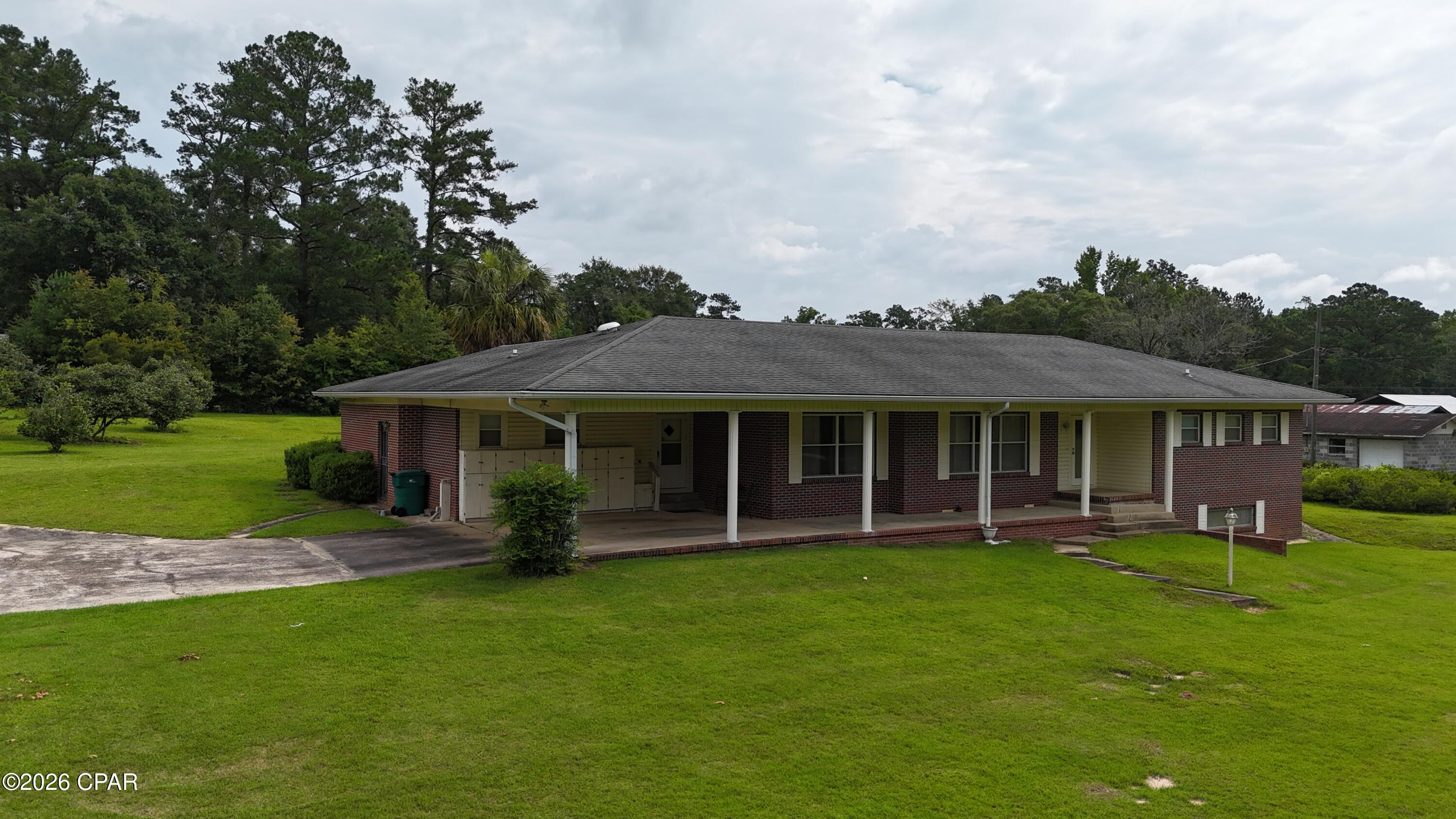 Charming 3-Bedroom Home on 1.9 Acres in the Heart of Bonifay
Enjoy the perfect combination of space, convenience, and small-town charm with this well-maintained 3-bedroom, 2-bath brick home located within the city limits of Bonifay. Situated on an expansive 1.9-acre property, this home offers plenty of room to spread out while still being close to schools, shopping, dining, and everyday conveniences. The home's durable brick exterior and attached carport provide both practicality and curb appeal. Whether you're looking for room for a garden, outdoor activities, or simply extra privacy, the generous acreage offers endless possibilities. An added bonus is the location--just approximately 52 minutes from Panama City Beach and the stunning Gulf Coast, known for some of the world's most beautiful white-sand beaches and emerald waters.  Don't miss this opportunity to own a spacious property with the convenience of in-town living and easy access to the beach. This property truly offers the best of both worlds.