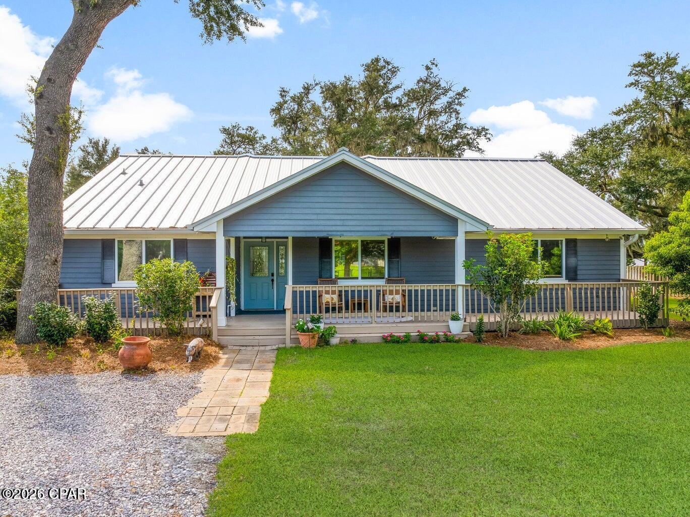 Beautiful home only 12 miles to TAFB and to PCB...you feel like you are on your own private oasis but only minutes to restaurants, shopping and entertainment! 

Situated on a spacious .62-acre lot, this inviting lakefront home boasts high ceilings and an abundance of natural light, creating a warm and open atmosphere. The open floor plan includes 3 bedrooms and 2 bathrooms, providing ample space for both relaxation and entertaining. 

Step outside to the expansive screened in back porch, that allows you to enjoy the tranquil lake views while staying protected from the elements. Surrounded by majestic oak trees, this outdoor oasis offers the perfect setting for entertaining, dining, family activities or simply unwinding with a good book.

With a private dock featuring a jet ski lift, a newly installed saltwater pool with a sun ledge and hot tub, and a prime location on a private road, this lakefront home offers the ideal combination of luxury and comfort. 

Don't miss the opportunity to make this charming property your own personal lakeside retreat.