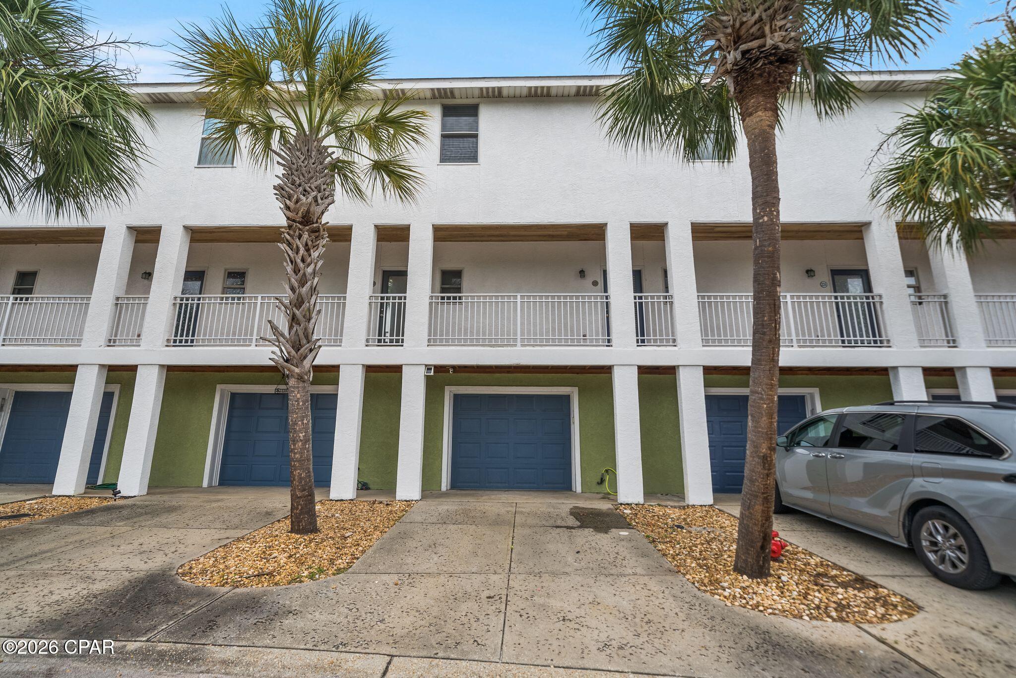 CURRENTLY UNDER CONTRACT, SELLER WILL CONSIDER BACK UP OFFERS. Tucked into the heart of the East end of Panama City Beach, this charming townhome just steps from the beach offers an easy entry point into one of Florida's most in-demand coastal markets. With just over 1,000 square feet, the 2-bedroom, 2-bath layout delivers comfortable, low-maintenance living well suited to long-term renters, second-home buyers, or investors looking to capitalize on strong short-term rental demand.

The incoming producing and turn-key vacation rental has a location that offers the best of both worlds. A quiet, tucked-away neighborhood setting that still keeps you minutes from the beach, the lagoon, and local shops and restaurants. Mornings start with easy access to coffee and sand, afternoons are made for cruising to nearby favorites, and evenings bring you back to a peaceful community away from the crowds.

Community amenities add to the appeal, including a community pool, a community room, and boat slips available on a first-come, first-served basis. Inside, the home features a functional floor plan, a private garage, and a cozy, manageable footprint that makes it easy to maintain whether you're living here full-time or renting it out.

This is an affordable opportunity to own in Panama City Beach with genuine rental upside. This unit has been rented for 4 straight years and offers over $30,000 in gross rental income.

Great deal as a steady long-term rental, a personal beach escape, or an income-producing property when not in use. Location, lifestyle, and value come together in this well-positioned coastal retreat.