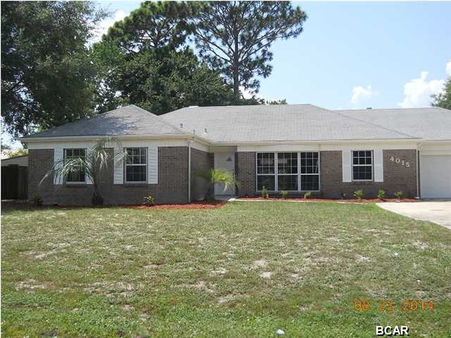Newly renovated home, Freshly painted interior and exterior, Landscaped yard, Home is located just 3 blocks to the Venetian Sunset Park, enjoy wonderful sunsets of St Andrews Bay. This home has Laminate wood floors throughout except for the bedrooms which have new carpet and bathrooms are tiled. Kitchen has been remodeled with new cabinets and counter tops as well as Stainless appliances. New fixtures throughout the home. Bathrooms have new vanities and fixtures as well. Great room has a nice brick fireplace along the back wall and just off the living room and kitchen you have a large dining area as well as a bonus room and separate laundry room. The garage is oversized and has built in cabinets against the back wall. Total sq' under roof is 2273sq'.